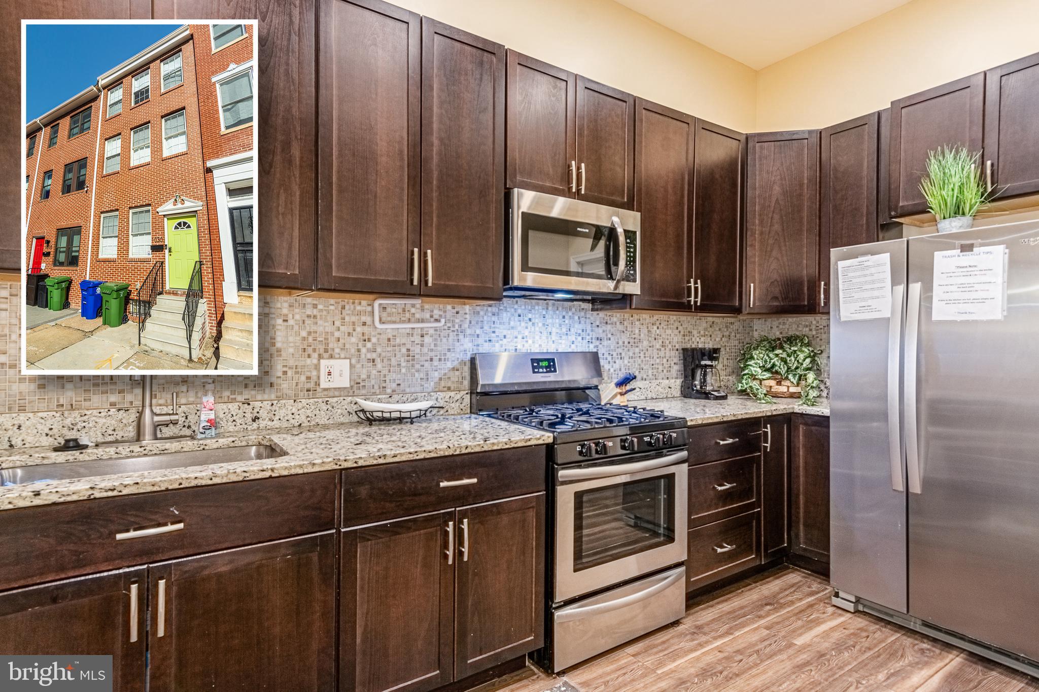 BEAUTIFULLY DESIGNED HOLLINS MARKET ROWHOME WITH 4 FINISHED LEVELS OF LIVING SPACE!  Features include a main level with a spacious living room, separate dining area, main level half bath, gourmet Chef's kitchen with granite counters, ss appliances, and tons of living space, main level bedroom suite with a full bath, 2nd level with 2 bedrooms, 1 full bath, a large den, and desirable bedroom level laundry, 3rd level Primary bedroom suite with soaring ceilings, a full bath, and a walk-in closet, a finished basement with a family room, and a rear patio for entertaining.  Located minutes from UMMC, stadiums, downtown Baltimore, and major roadways.