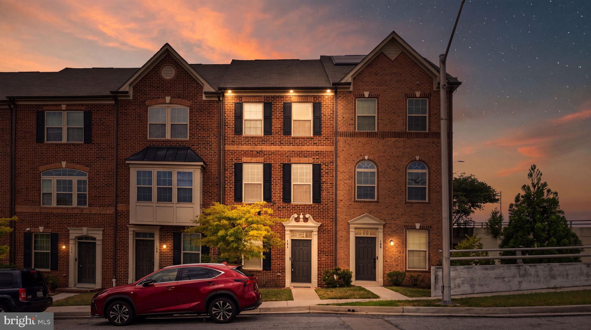 Welcome to 102 Oldham, nestled within the quiet & private community of Oldham Crossing. This well-appointed home offers fresh paint & new carpeting throughout, creating a move-in ready feel from the moment you arrive. The entry level welcomes you with a spacious bedroom & full bathroom, ideal for guests, a home office, or flex space. The sun-filled main living level features gleaming hardwood floors, 9-foot ceilings, & open sight-lines from the living room to the kitchen, creating an inviting space for everyday living & entertaining. The kitchen is equipped with 42" cabinetry, stainless steel appliances (2025), a breakfast bar, center island, & access to the rear composite deck overlooking the community. The upper level includes a spacious primary suite with a large custom closet featuring built-ins & an en-suite bath complete with dual vanities & a dual-head shower. An additional bedroom, full bathroom, & conveniently located stackable laundry (2025) complete this floor. The top-level suite offers a private retreat with a walk-in closet & its own en-suite bathroom. Enjoy morning coffee or weekend gatherings on the rear composite deck with peaceful community views. Additional highlights include an oversized garage with ample storage space, a full-size driveway providing a second parking spot, & access to community amenities including a dog park and tot lot.  Conveniently located near Routes 895, 95, and 695, with easy access to Yard 56, Canton Crossing, & Fells Point.
