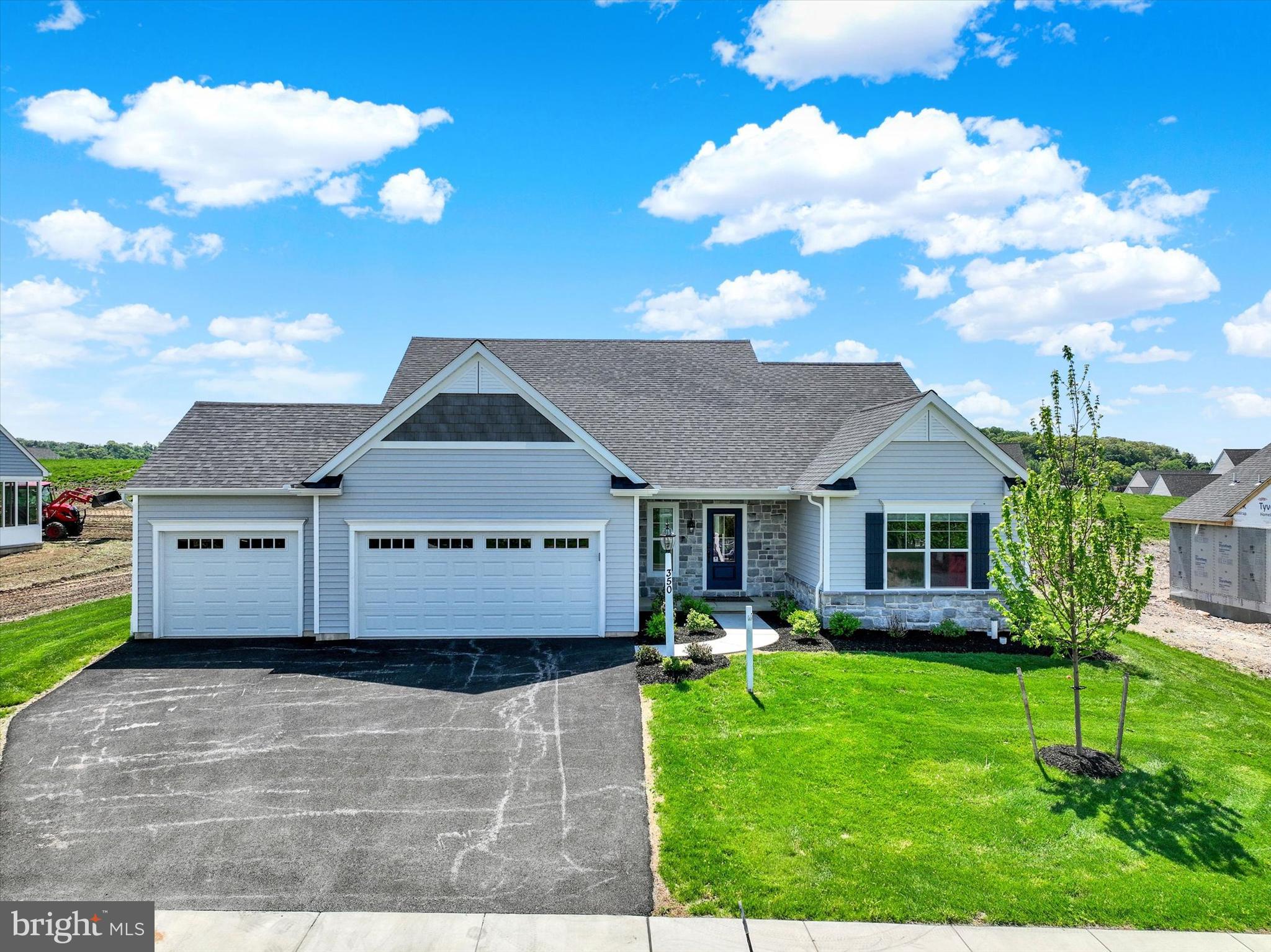 THIS HOME IS NOT FOR SALE. It is the new sales center, in the FINAL PHASE of Eagles View, an open space community in the sought-after Central York School District - Stunning 3BR, 2BA “Summergrove,” with a revised layout including basement access off the kitchen and walk-in closet off the foyer. This is the upgraded American Elevation with a spacious 3-car garage. Thoughtfully designed to showcase the best of EGStoltzfus' craftsmanship and options. The heart of the home is the culinary kitchen, where a cathedral ceiling adds volume and light. Enjoy an expanded center island, quartz countertops, upgraded cabinetry, stainless steel appliances, and a spacious dining area with a built-in bar area—perfect for a coffee bar or entertaining station. The family room continues the open feel with a cathedral ceiling and a cozy gas fireplace, ideal for gatherings or quiet evenings. Retreat to the primary suite, which offers a walk-in closet, a luxurious bath with dual vanities, and a private adjoining flex room—perfect for a home office, nursery, meditation space, or whatever other space you might need. A door leads to the back entry hall with built-in locker shelving. Two additional bedrooms and a full bath are tucked away in the front of the home, offering privacy and comfort for family or guests. There is also a full lower level with an outside entrance, that could be finished into additional living space or use it as storage space. Choose from a variety of thoughtfully designed floor plans, including 1-story, 2-story, and 1st-floor primary suite options, all ready to be personalized to suit your lifestyle. What sets EGStoltzfus apart is their commitment to exceptional customer service and true customization. From exterior elevations to vaulted ceilings, upgraded kitchens and baths, cozy fireplaces, expanded living spaces, finished lower levels, screened-in patios, decks, and even 3-car garages—you have the freedom to design a home that’s uniquely yours and unlike many builders, EGStoltzfus makes the process easier by requiring no construction loan. Build the home you’ve always imagined—on your terms, in a community you’ll love.  AGENTS - Please read Agent Remarks for additional information including current builder incentives being offered.