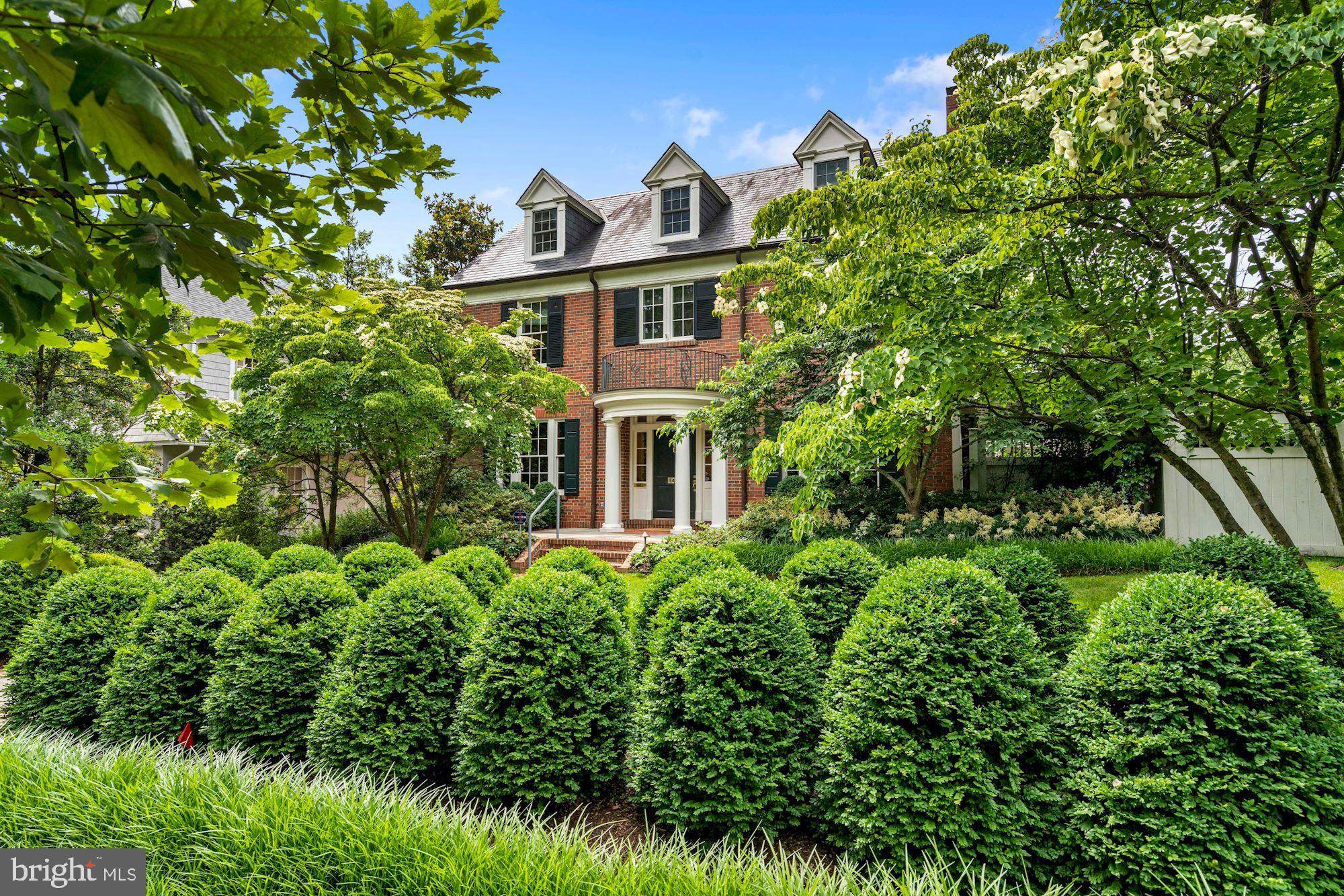 MAJOR PRICE REDUCTION! The iconic home at 3414 Lowell underwent a complete renovation and expansion in 2001 overseen by Stephen Muse.  Roughly 3000 sq ft were added, all systems were replaced, new slate and copper roofs were installed, windows and doors were replaced and the house was reoriented to the side to take advantage of the natural setting created by the double lot.  The result is a stunningly beautiful residence--it is perfectly integrated with the outdoors and is an entertainer's dream.  A classical loggia runs along the west side of the house offering multiple covered seating areas from which one can admire the gardens, the fountain and the National Cathedral.  There are large airy common rooms on the first floor  along with a cozy book room and library.  The oval dining room with domed ceiling is dramatic and inviting. Upstairs numerous bedrooms can accommodate everyone.  Two of the bedrooms are currently set up as wonderful comfortable offices.  The lower level has a studio apartment for guests or staff, an office, a movie room and a gym as well as abundant storage and an oversized two car garage.  There is a generator to keep things humming along in the event of a power outage.