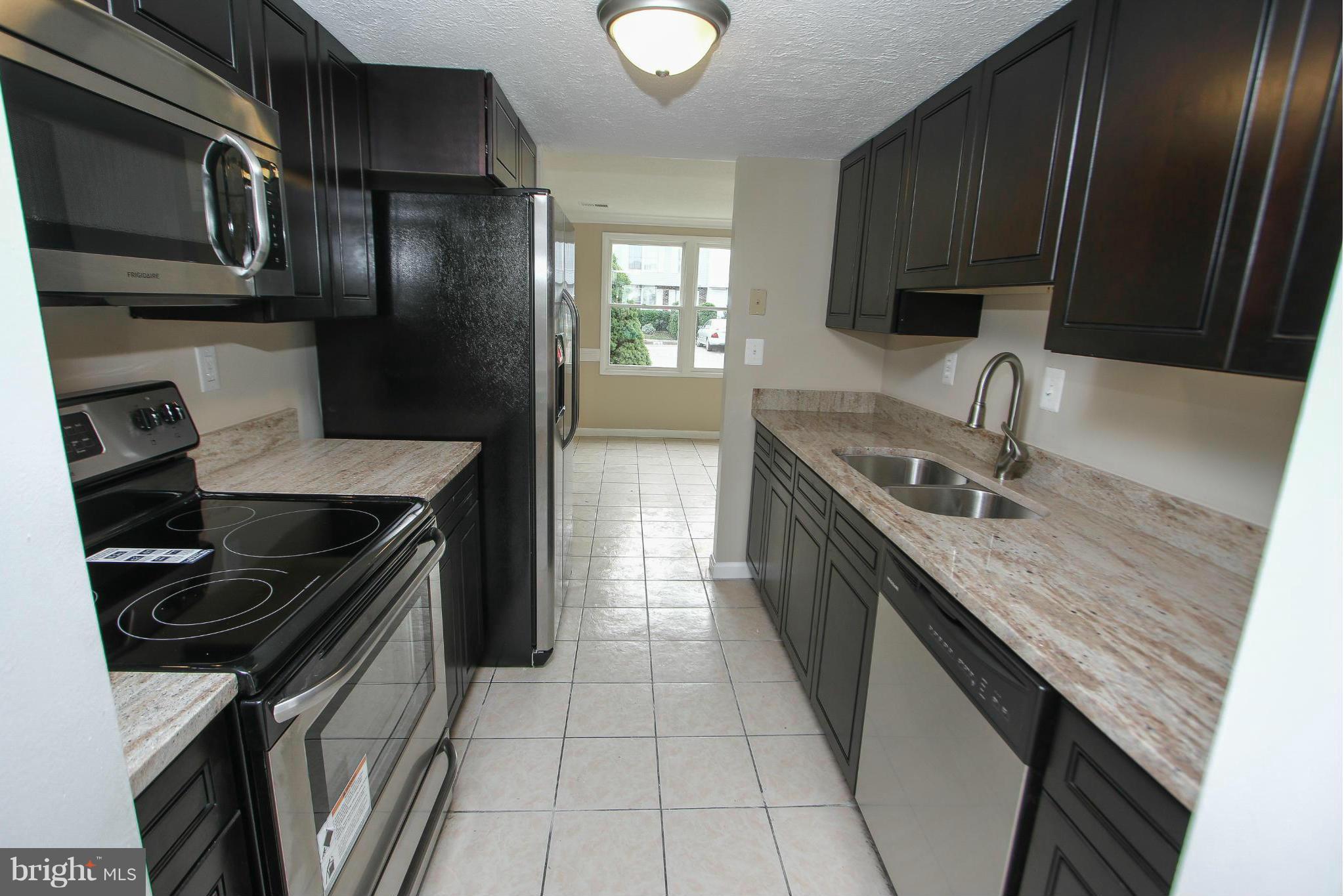WOW!! Beautifully updated townhome with NEW carpet, paint, kitchen cabinets, GRANITE, Stainless Steel appliances!! NEW Bath vanity!! Find 3 bedrooms upstairs, and plenty of room downstairs for entertaining and enjoying! Back deck. Great location close to shopping, services, and schools. Amazing opportunity to own a home, HURRY, this won't last long!!