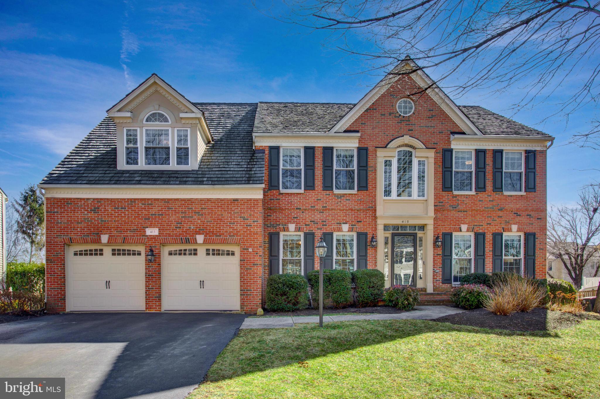 ACCEPTING BACK-UP OFFERS!  COME SEE THIS METICULOUSLY UPDATED COLONIAL IN PRESTIGIOUS WOODLEA MANOR
Welcome to this beautifully refreshed brick-front colonial, where 2024 updates meet timeless elegance. This exceptional home has been thoughtfully enhanced throughout, offering modern luxury with every comfort imaginable.
The main level welcomes you with a sophisticated blend of formal and casual spaces. The dramatic two-story family room serves as the heart of the home, featuring a stunning floor-to-ceiling stone fireplace and motorized Roman Shades (2024).The newly remodeled kitchen (2024) showcases elegant white shaker cabinets with refined black hardware, creating a bright, contemporary aesthetic. Custom living continues with a dedicated study, formal living and dining rooms, and a freshly updated powder room (2024).
Upstairs, four generous bedrooms await, including a luxurious owner's retreat with newer carpeting and an absolutely stunning renovated bathroom (2022, warranty through KBF Audi). The spa-like ensuite bathroom features heated floors, dual vanities, and an enviable walk-in closet with premium custom built-ins. Three additional bedrooms, each newly equipped with three-way switches and ceiling fans (2024) one bedroom has ensuite bathroom  and two share access to the renovated hall bathroom. The upper level hallway and second staircase showcase brand new hardwood flooring (2024).
The finished walk-up lower level offers endless possibilities with new premium carpeting (2024), a spacious recreation room, a bonus room (could function as a 5th bedroom), full updated bathroom, and refreshed staircase. Recent whole-house improvements include new paint throughout and a whole-house steam humidifier (2024).
Outdoor living shines with a versatile covered porch featuring ceiling fans and TV connectivity, perfect for three-season enjoyment with potential for four-season conversion. The space flows seamlessly to a Trex deck overlooking the professionally landscaped, fenced backyard. Modern conveniences include a new Ring camera system and dishwasher (2023).
This impeccable home sits in the heart of Woodlea Manor, offering walking distance access to community amenities including:

Resort-style pool
Clubhouse
Basketball courts
Tennis/pickleball courts
Community park

Ideally located near Route 15 with easy access to Leesburg, Route 7, and the Dulles Greenway.
4 Bedrooms | 4.5 Bathrooms | Multi-Level Living