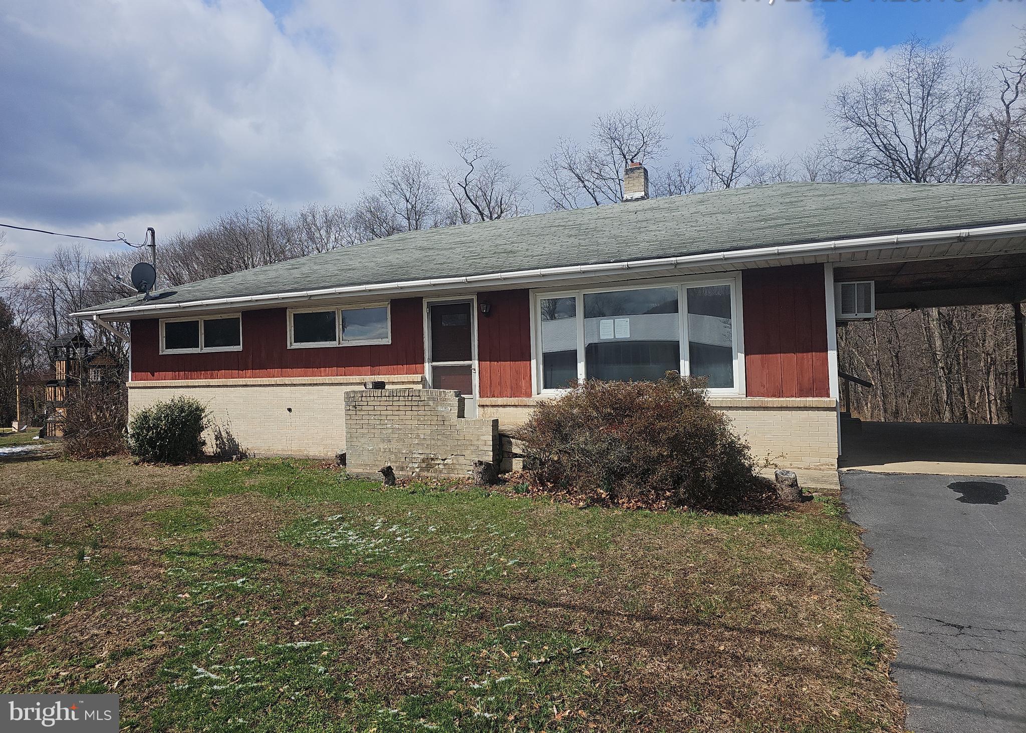 Welcome to this brick ranch home in Duncannon. The property features 3 bedrooms, 1 bathroom, and a living room with built-in shelving. Additional highlights include a 1-car carport with ample driveway parking, a rear deck overlooking a tree-lined lot, and a walk-out basement offering additional potential. This home is ready for a new owner to add their personal touches and make it their own. HUD-owned property. Call today for more information.