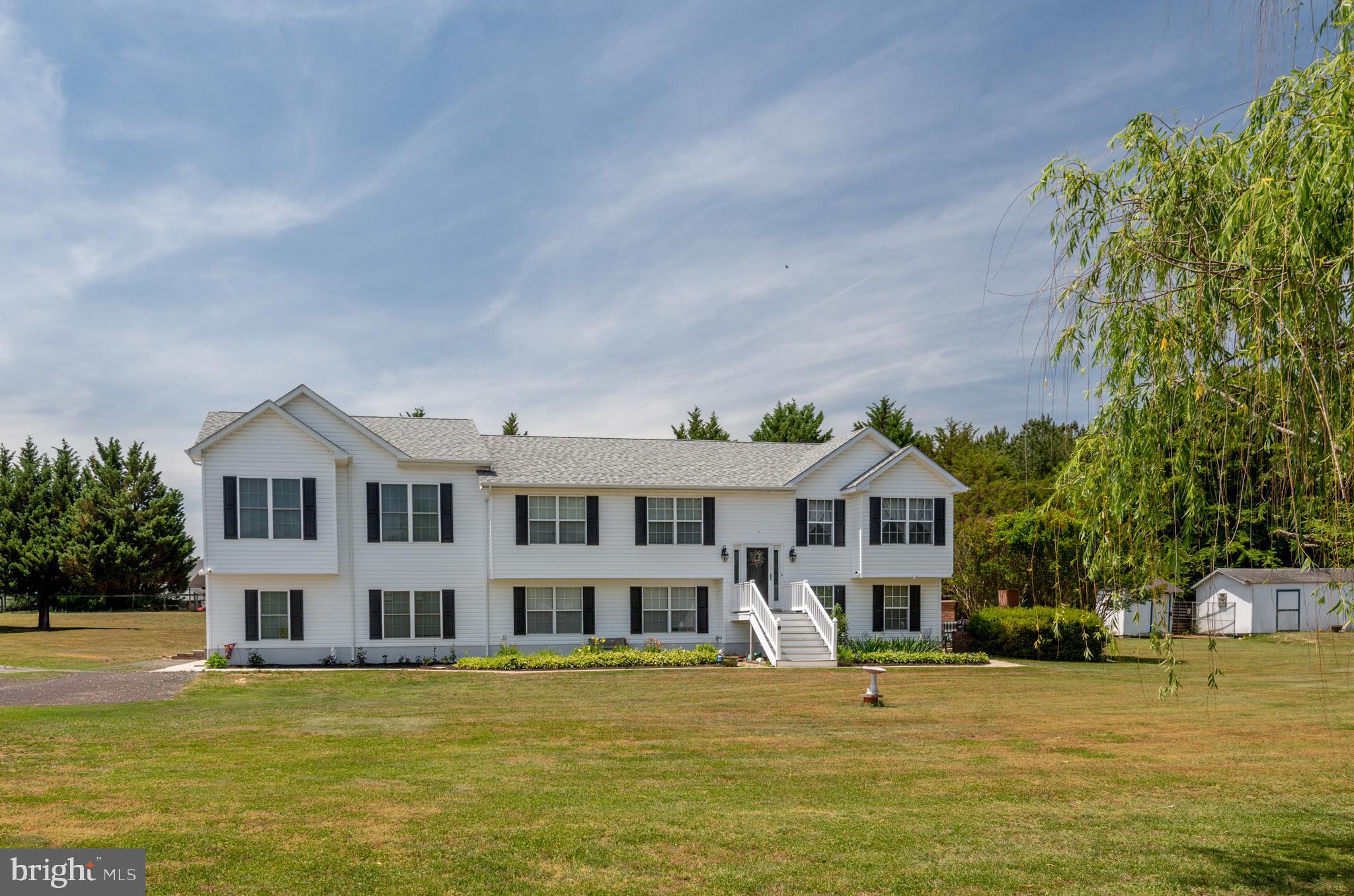 Welcome to this truly one-of-a-kind Mechanicsville property offering an incredible combination of space, style, and functionality! Situated on a beautiful 1.6-acre lot, this impressive home features 8 bedrooms and has been thoughtfully updated to create the perfect blend of modern luxury and comfortable living.
The heart of the home is the stunning, fully renovation, highlighted by an expansive open-concept design that's perfect for entertaining. The gourmet kitchen is a showstopper, featuring a massive center island, custom cabinetry, stylish finishes, abundant counter space, huge walk in pantry and an effortless flow into the living and dining areas. Whether you're hosting holiday gatherings or everyday family meals, this space was designed to bring people together.
The spacious primary suite offers a private retreat with a luxurious spa-inspired bathroom, complete with a freestanding soaking tub, oversized custom tile shower, elegant finishes, and a large walk-in closet.

Throughout the home you'll find generous rooms, updated flooring, abundant natural light, and flexible living spaces ideal for multi-generational living, large families, home offices, guest accommodations, or hobby rooms.
Outside, enjoy the privacy and possibilities of 1.6 acres, offering plenty of room for outdoor entertaining, The Custom Brick Patio and fireplace with grill and Firepit are perfect for enjoying the peaceful Southern Maryland setting.
With eight bedrooms, extensive renovations, a magazine-worthy kitchen, spa-like owner's suite, and room to spread out both inside and out, opportunities like this rarely come along. This is the home you've been waiting for!