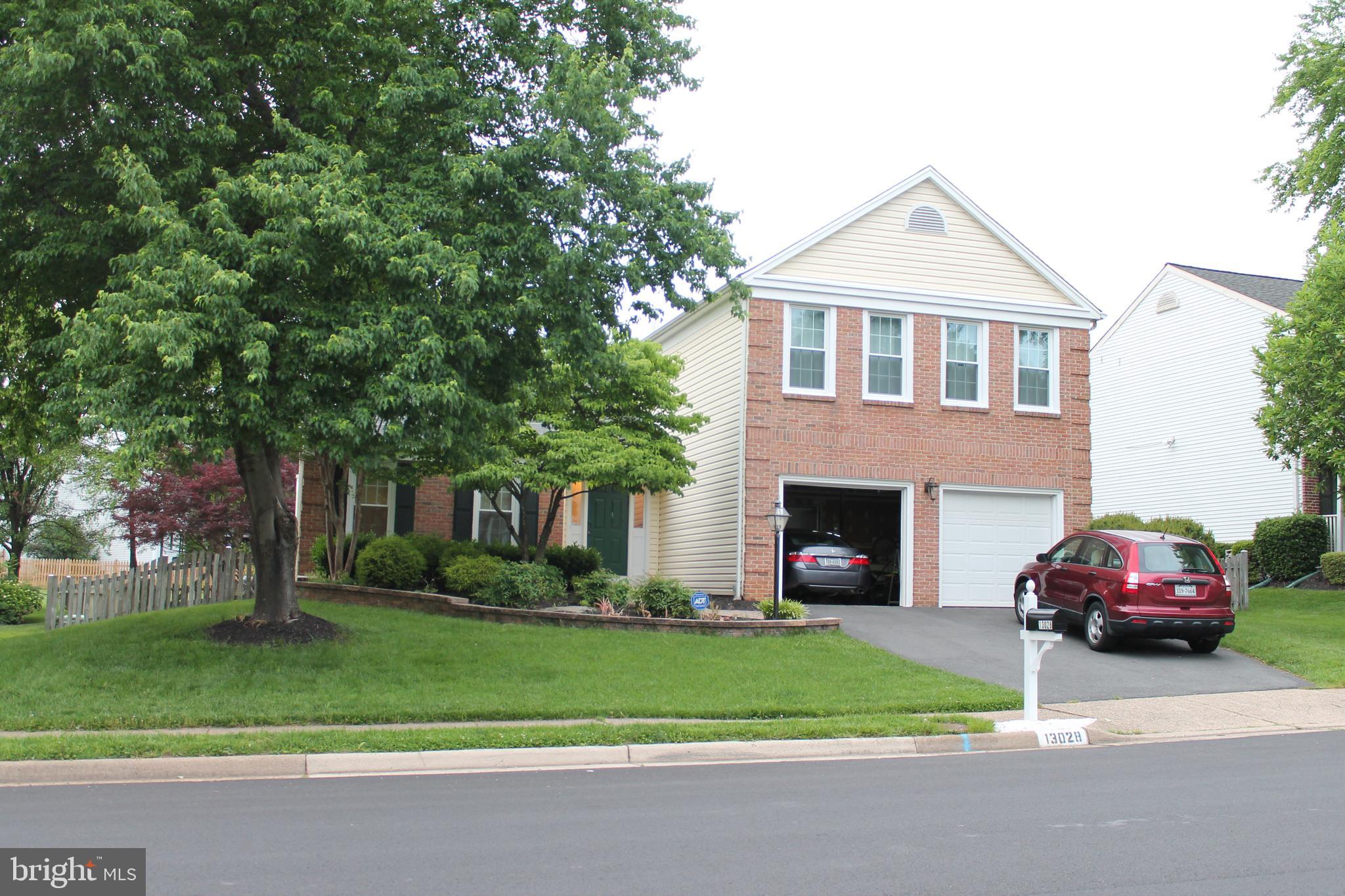 Bright & sunny 4BR, 2.5BA brick front colonial in highly sought after Bradley Acres. Skylights, vaulted & cathedral ceilings give this home an open feel. Great  hardwood floor throughout the house. Wood burning fireplace. Large deck with fenced yard great for entertaining. In-ground sprinkler system front & back yard for easy maintenance. Beautiful nature and walk path right behind the house. Beautiful community pool is available for the whole family in the summer without extra charge. Great school pyramid (Fox Mill Elementary School / Rachel Carson Middle School / South Lake High School). Available on July 1st! Credit score more than 650 and income more than $100K required.