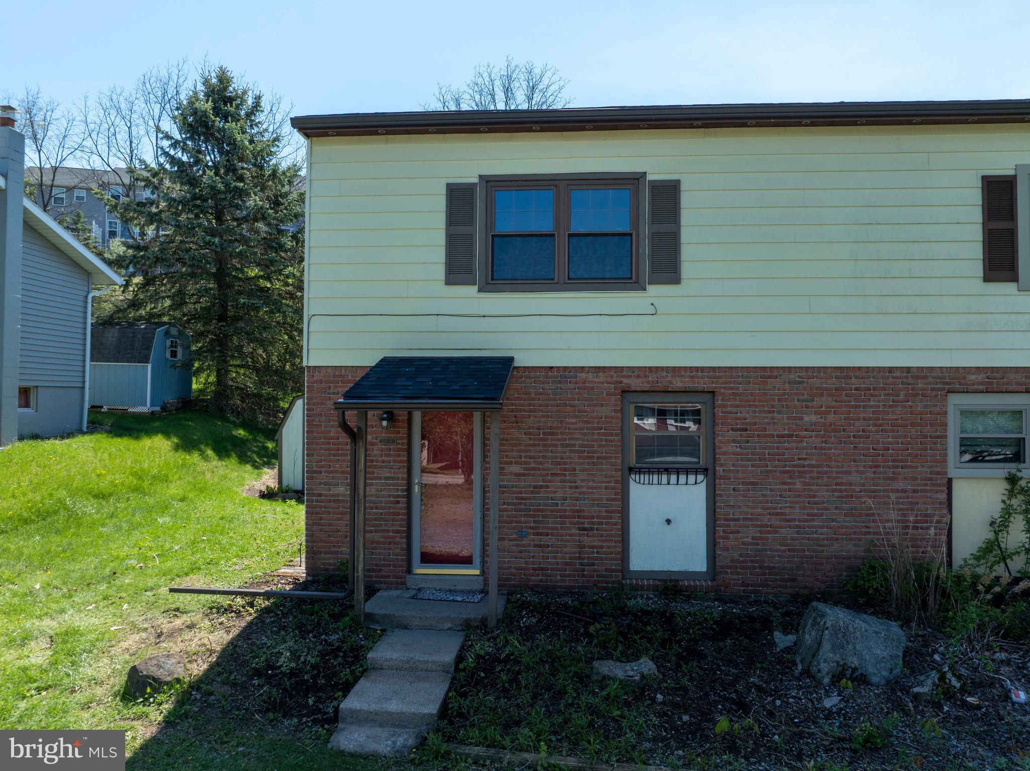 Opportunity awaits at this 3 bed, 1.5 bath half‑duplex condo in charming Boalsburg, close to local shops, parks, restaurants and everyday conveniences. With no HOA or monthly fees, it offers easy living in a great location. The main floor features vinyl flooring throughout, a spacious living room, adjoining dining area, an L‑shaped kitchen, and a convenient half bath, along with laundry closets. An enclosed porch with a knotty pine ceiling brings in natural light and overlooks a private backyard. Upstairs are three nicely sized bedrooms and a full bathroom. A shed provides additional storage options. With plenty of space, room to personalize and a brand-new roof (2026), this property in the heart of Boalsburg is ready for you! Call for a tour today!

Financing is difficult due to being non-warrantable so please check with listing agent for details.