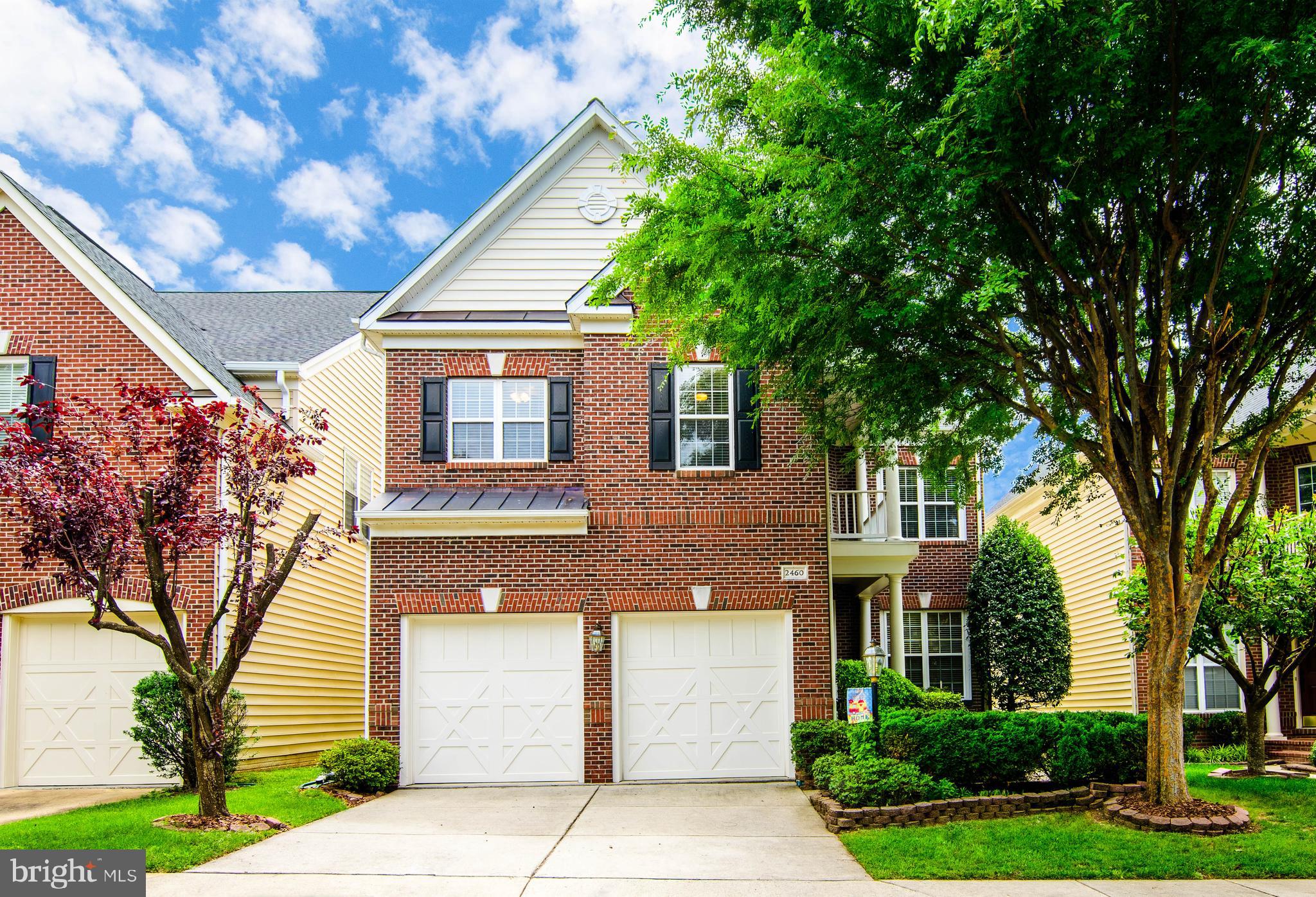 Welcome home to your stunning brick-front single-family house located in sought after Great Oak. A small community of elegant homes and townhouses with its “pocket park” and play area. As you walk through the front door, you are greeted by an elegant two-story foyer, a sweeping spiral staircase, gleaming hardwood floors and 10ft ceilings - creating an upscale feeling. A cozy sunlit living area to welcome guests followed by a nicely appointed dining room for formal dining. The gourmet kitchen with an abundance of beautiful cabinetry, newer stainless-steel appliances, including a double-wall oven and granite countertops is a chef’s delight. The butler’s station is perfect for a beverage center.  The adjoining extended eat-in kitchen opens to a Trex deck, making it easy to enjoy morning coffee or relaxed evening dinners outdoors. The large bright and airy extended family room, with its large windows, is great for family time or making entertaining an everyday living pleasure. The double-sided gas fireplace creates a warm and inviting ambiance, enjoyed from both the family room and the adjacent private office/study room —perfect for today’s remote professionals. The kitchen eat-in area and family room rear extension significantly enhances the home's size and functionality. 
Ascend the elegant staircase to an upper level with a sweeping hallway that leads to an expansive primary suite that offers a private retreat with generous proportions including a sitting area and a double-sided fireplace to create cozy evenings and a bank of windows providing beautiful sunlight during the day. The primary suite also includes a tray ceiling, generous his-and-her walk-in closets, and a beautifully spa-inspired ensuite bath with jetted tub, separate shower and dual vanities. There are three additional large bedrooms, including an ensuite, and another bedroom with its own personal vanity. There is a walk-in laundry room and all ceilings are 9ft.
The fully finished lower level is both stylish and versatile, featuring a large flex room with a full bathroom that can be used as a guess room, gym or playroom. A generous recreation space, great for family gatherings and an additional half bath and storage room completes this multipurpose level.
This stunning home enjoys a choice location, ideally located within a couple of blocks from Monroe Silverline Metro and Bus Station, less than a mile to Toll Road, less than 10 miles from Dulles Airport, near an array of shopping centers and the Reston Town center.