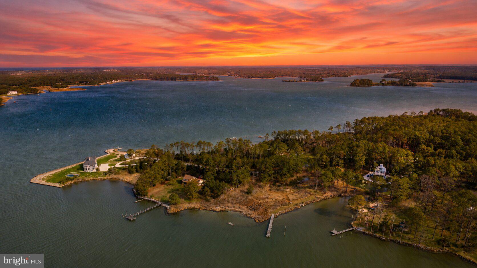 Set on just shy of 4.5 private acres at the end of a quiet dead-end road, this stunning property boasts over 2,700 square feet, five bedrooms, and an incredible 1,000 feet of water frontage—creating a rare combination of space, privacy, and panoramic views of coveted Little Choptank River.
Designed and built by an architect for their own personal retreat, this one-of-a-kind coastal waterfront sanctuary blends thoughtful design with the natural beauty distinct to the Eastern Shore.
Enjoy effortless waterfront living with your own private pier featuring 3’ mean low water, a protected lagoon, and endless opportunities for boating, jet ski'ing, crabbing/fishing, kayaking, and exploring nature abound. Surrounded by wildlife and untouched beauty, this is the kind of setting that feels worlds away—yet you’re just minutes from the charm, dining, and shops of downtown Cambridge.
And the opportunities don’t stop there!!--NO HOA and strong Airbnb potential make this not only a dream retreat, but a smart investment just in time for summer.
