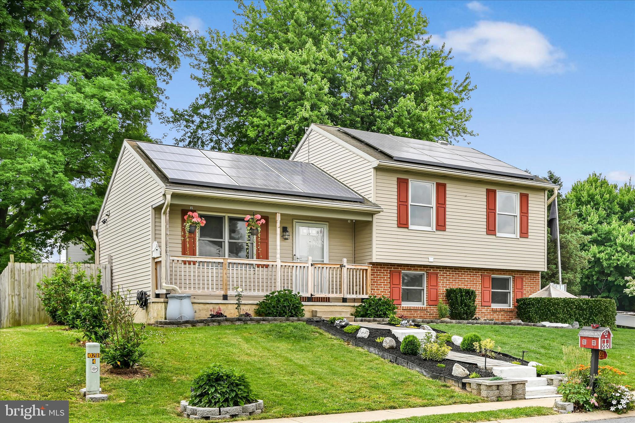 Welcome home to 101 Foxchase Drive in the heart of Elizabethtown Borough! This well-maintained 3-bedroom, 1.5-bath split-level home offers comfortable living, energy-efficient features, a convenient location, and a spacious outdoor setting perfect for everyday enjoyment.

A charming gated front porch welcomes you home, while two front walkways provide easy access—one leading to the street and the other wrapping around to the driveway and attached garage. Step inside to a bright and inviting living room that flows into the eat-in kitchen, where all appliances, including the refrigerator, will remain with the home. Sliding glass doors off the kitchen open to a large deck overlooking the backyard, creating the perfect space for outdoor dining, entertaining, or simply relaxing.

The upper level features three comfortable bedrooms and a full bath with a tub/shower combination. On the lower level, you'll find a versatile bonus room ideal for a family room, recreation room, home office, or den, along with a convenient half bath/laundry combination room. This level also provides direct access to the attached one-car garage.

Outside, enjoy a sizable fenced backyard with plenty of room for pets, play, gardening, or gatherings. The expanded driveway offers valuable additional off-street parking. Adding to the home's appeal are solar panels, offering an energy-conscious feature that can help reduce utility costs and improve efficiency.

Location is everything, and this home delivers! Enjoy the convenience of being within walking distance of all Elizabethtown Area School District schools as well as the annual fairgrounds and community events. Elizabethtown is beloved for its small-town charm, welcoming community, local shops and restaurants, parks, and easy access to major destinations. Commuters will appreciate being just minutes from the Elizabethtown Amtrak station, providing easy rail access to Harrisburg, Lancaster, Philadelphia, and beyond. The home is also conveniently located near Harrisburg International Airport and the Pennsylvania Turnpike, making travel throughout the region a breeze.

Don't miss this opportunity to enjoy comfortable living in one of Lancaster County's most convenient and desirable borough locations!