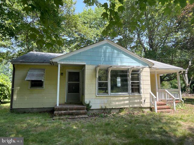 Property is located on an acre in a rural setting yet within a 1/2 mile to Route 50. Detached 2 car garage with electric in rear of property. Built-ins remain for extra storage throughout home. Some updates have been made to bath but still elements of the past give it a vintage vibe. Property strictly sold as is. HUD CASE 244-033541.  Please see website hudhomestore for details