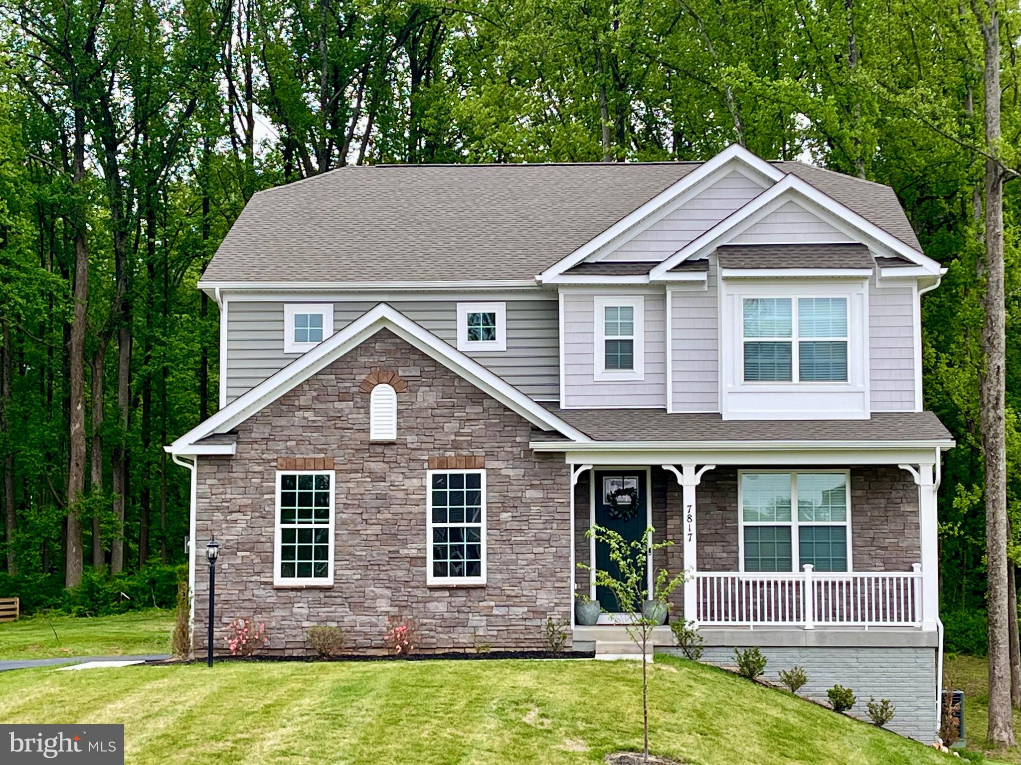 PRICE REDUCED* From the moment you step inside, you’ll appreciate the modern finishes, Smart Home features, and open floor plan of this 2025 uniquely colored front-brick home. 
The kitchen is made for gathering with a large island, dining area, plenty of counter space and oodles of storage in a large walk-in pantry.  This level also features a flex room, a bedroom and a full bath; perfect for guests or multi-generational living.

 The large primary suite is beautifully appointed with trayed ceiling, crown molding and sitting area. The bath features a deep soaking tub, separate shower and separate vanities.  The large two-sided walk-in closet is thoughtfully designed for two and conveniently leads to the laundry.  The remaining two bedrooms are spacious with large closets and share a separate bathroom.  As a bonus, the upper level has a generous loft with abundant space for a possible library, family room, yoga…let your imagination run wild. 
The finished walk-out basement has the fifth bedroom, full bath, walk-in closet, and additional separate open space for movie watching, game night, and home gym. 
All on an acre of land that backs to trees (behind Snow Hill) for added privacy. 
This isn’t just a home…it’s a lifestyle. Stroll through the community’s trails or explore Leopold’s Preserve, then hit nearby Harry’s, Pearmund Cellars or The Farm Brewery.  Enjoy summer at Silver Lake Park and the WARF. Visit the quaint historic districts of Haymarket and Warrenton...full of charm with unique shopping and dining options.  Convenient to I66, Rt15, commuter lot, and a short commute to VRE Broad Run Station, which will bring you directly into Washington DC. Broad Run offers an increasingly rare opportunity of rural beauty, wine country, outdoor recreation and easy access to major routes and shopping destinations, while still retaining a quiet country living feel.