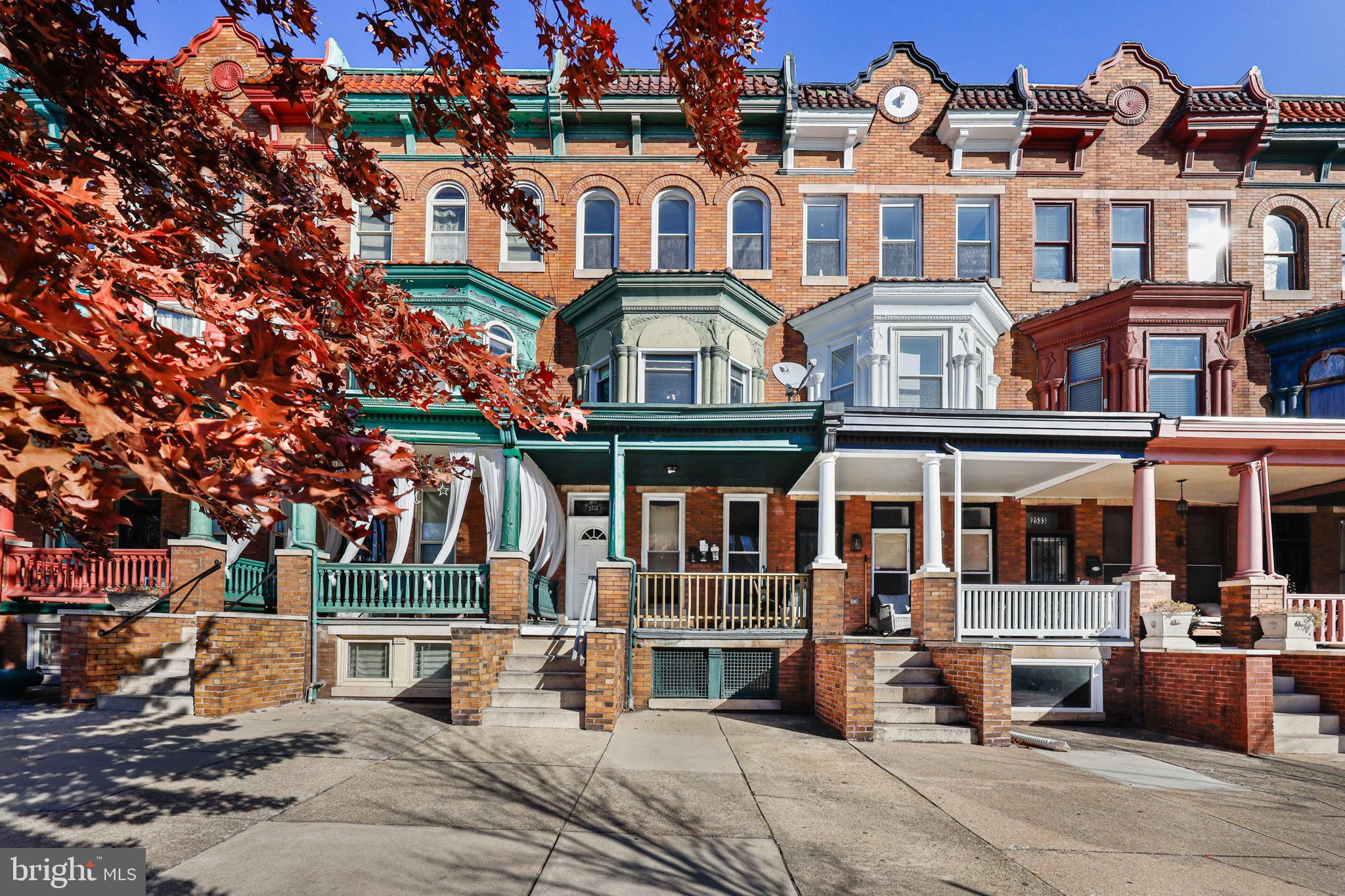Come live in the middle level apartment of this wonderful and historic home. Located just a few steps from Druid Hill Park with its gorgeous lake and miles of hiking and biking trails there are tons of activities to get into.  Living on the 2rd floor certainly has some perks- the rear balcony off the kitchen and the huge windows front and back give unobstructed city and sunset views.  Hardwoods span the entire level and shine with care.  The front bedroom is very spacious at 19x13 and features  a gorgeous triple bay window.  There is a 2nd bedroom in the middle of the apartment that features a historic and decorative fireplace mantel that is so fun to decorate.  This space could also act as your living room if you don't need 2 bedrooms. You'll love the convenience of this area. Centrally located, Reservoir Hill neighborhood has easy access to Rt 83 and  residents love the walkability and enjoy easy access to public transportation, including Metro Subway, Light Rail and buses. The rear yard offers private parking as well.