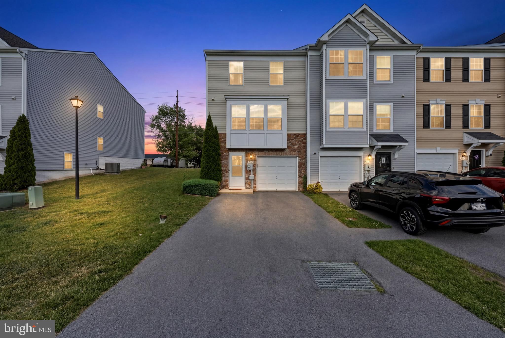 Nestled in the charming Manor Park community, this delightful end-of-row townhouse offers a perfect blend of comfort and modern living. Built in 2016, the home boasts a traditional architectural style with durable vinyl siding, ensuring both aesthetic appeal and low maintenance. Step inside to discover a spacious and inviting interior, featuring an open floor plan that seamlessly connects the dining and living areas. The cozy breakfast nook is perfect for morning coffee, while the well-appointed kitchen, complete with an island and ample table space, invites culinary creativity. Enjoy the convenience of modern appliances, including a built-in microwave, electric oven with self-cleaning feature, and a dishwasher, making meal prep and cleanup a breeze. With three generous bedrooms, including a master suite with a walk-in closet and a luxurious walk-in shower in the full bath, this home is designed for relaxation and privacy. The English basement offers additional space for storage or future customization, while the attic provides even more potential. Outside, the low-maintenance yard is perfect for enjoying the outdoors without the hassle, and the attached garage with inside access ensures easy parking year-round. The community amenities, including lawn care and snow removal, enhance the ease of living here. This home is not just a place to live; it’s a sanctuary where memories are made. Experience the warmth and comfort that awaits you in this lovely Manor Park townhouse.