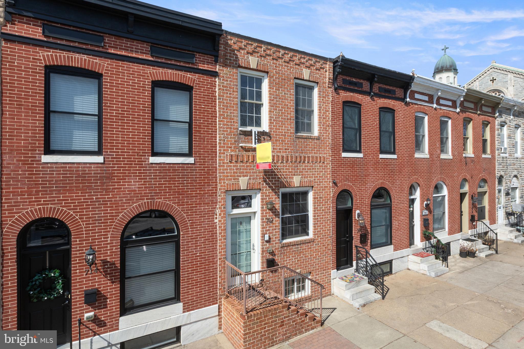 Don't miss the opportunity to make this yours! 3 bedroom, 3 bath with off street PARKING.  Prime location and amazing layout with over 2200 finished SF.   Functional open concept allowing an abundance of natural sunlight.  This will be turnkey for buyer.  A new roof was just installed and entire house was just professionally painted neutral.  Features include exposed brick, spacious kitchen with white cabinetry, granite counters, large island open to dining area, finished lower level with 3rd bedroom and full bath.  2 spacious upper level bedrooms with 2 full baths.  Deck off 2nd upper level bedroom (and rooftop ready).  Close to Patterson Park, Canton waterfront, O'Donnell Sq, all the city restaurants, shopping and conveniences.  Easy commute to 95, downtown Inner Harbor and John's Hopkins Bayview and Johns Hopkins Hospital.  Incredible space and function, this one won't last long!