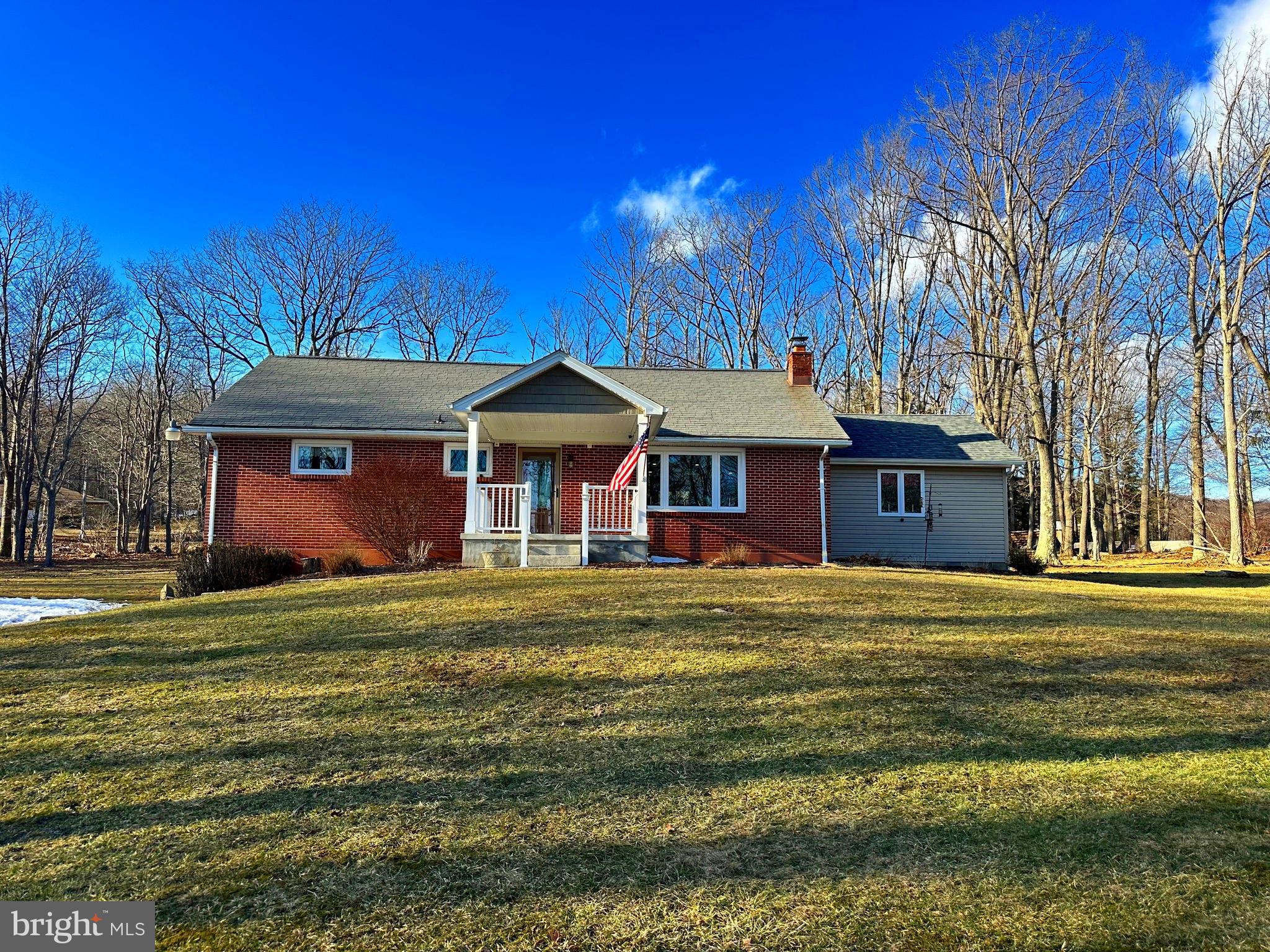 Here is the home you have been waiting for!! This beautiful 3 bedroom 1 bath brick ranch home sits on 1.6 acres on Kemp Drive. It has hardwood floors, an open kitchen/living/dining concept perfect for entertaining.  The kitchen has an island for extra counter space. There is a 2 car built in garage with storage that leads to the basement where the laundry is located. There is a wood stove in the basement and also hookup for a bathroom. It has a walk-up attic with plywood for plenty of extra storage.  Not to mention, the backyard is perfect for summer nights with a deck, concrete patio and a outdoor fireplace.  The windows were replaced 5 years ago, roof is approximately 20 years old and the stove is a year old. 
There is a second one car garage with a storage loft, electric, and a flu if you wanted to add a pellet or wood stove.