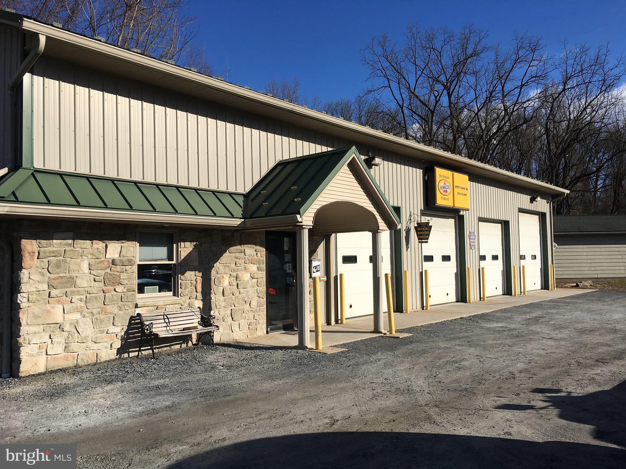 3 BUILDINGS:  1)  3,676 SF Main Garage with 4 bays, 4 overhead doors (3-10x10 & 1-12x10), 4 Lifts, Oil Radiant Heat in floor, 16’ ceilings & 2 Offices w/AC (10x13 and 10x12), mechanical room  and full bath.   Steel siding and roof, public sewer and well water; 2)  1,536 SF Garage Bldg. with 5 Bays & electric; 3)  2 Car Garage with electric.  Property is in excellent condition.  Sale includes Real Estate and Business Assets.