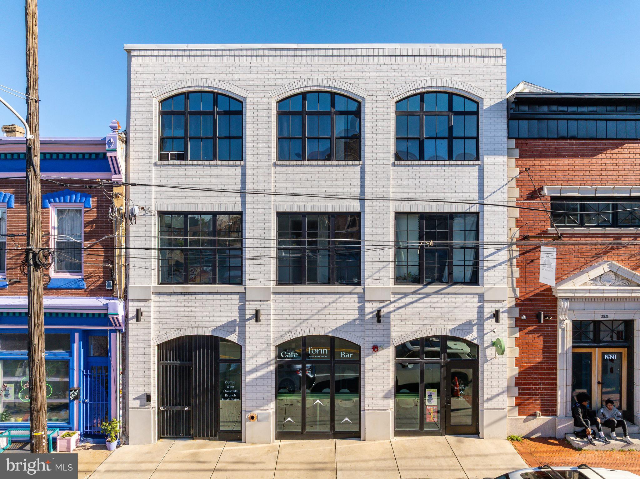 Introducing 2525 Frankford Avenue — a turnkey 7-unit investment property, prominently located with 36' of frontage on one of Philly's most recognizable streets — Frankford Avenue Fishtown. This fully-leased boutique apartment property features six (6) apartments over ground floor commercial space. The ±5500 SF, 3-storey building is comprised of six (6) 1bd x 1ba units atop 845 SF of destination retail space, leased long-term to Forin, a wildly popular "all-day cafe". Designed by Canno, the white-brick curb appeal emanates along the Frankford Ave corridor — surrounded by some of the city's best restaurants, retailers, cafes and bars. Factory styled oversized windows emit an overflow of natural light in the apartments coupled with slick kitchens and baths, European-inspired finishes, high ceilings, and laundry and storage for convenience.  Purchase this irreplaceable multifamily building in a Top-10 USA MSA where extremely high barriers-to-entry exist — the top destination in the world to visit in 2026. 2525 Frankford boasts a completely walkable setting in Fishtown proper, with an abundance of amenities and conveniences available within a short stroll, such as: The Market-Frankford El train, Shake Shack, La Colombe, Kalaya, Forin, Suraya, LMNO, Goldie, City Fitness, Front Street Cafe, Middle Child Clubhouse, Laser Wolf, Wm. Mulherin's Sons, Pizzeria Beddia, Palmer Park, and more. Fishtown has become a locally-prized destination for top chefs, retailers and creators — and tenants alike.  There is no shortage of residential demand in this coveted submarket. There are limited opportunities to invest in high-quality real estate in Fishtown due to its scarcity. High-growth rental submarket. 10yr tax abatement. Minimal OPEX.