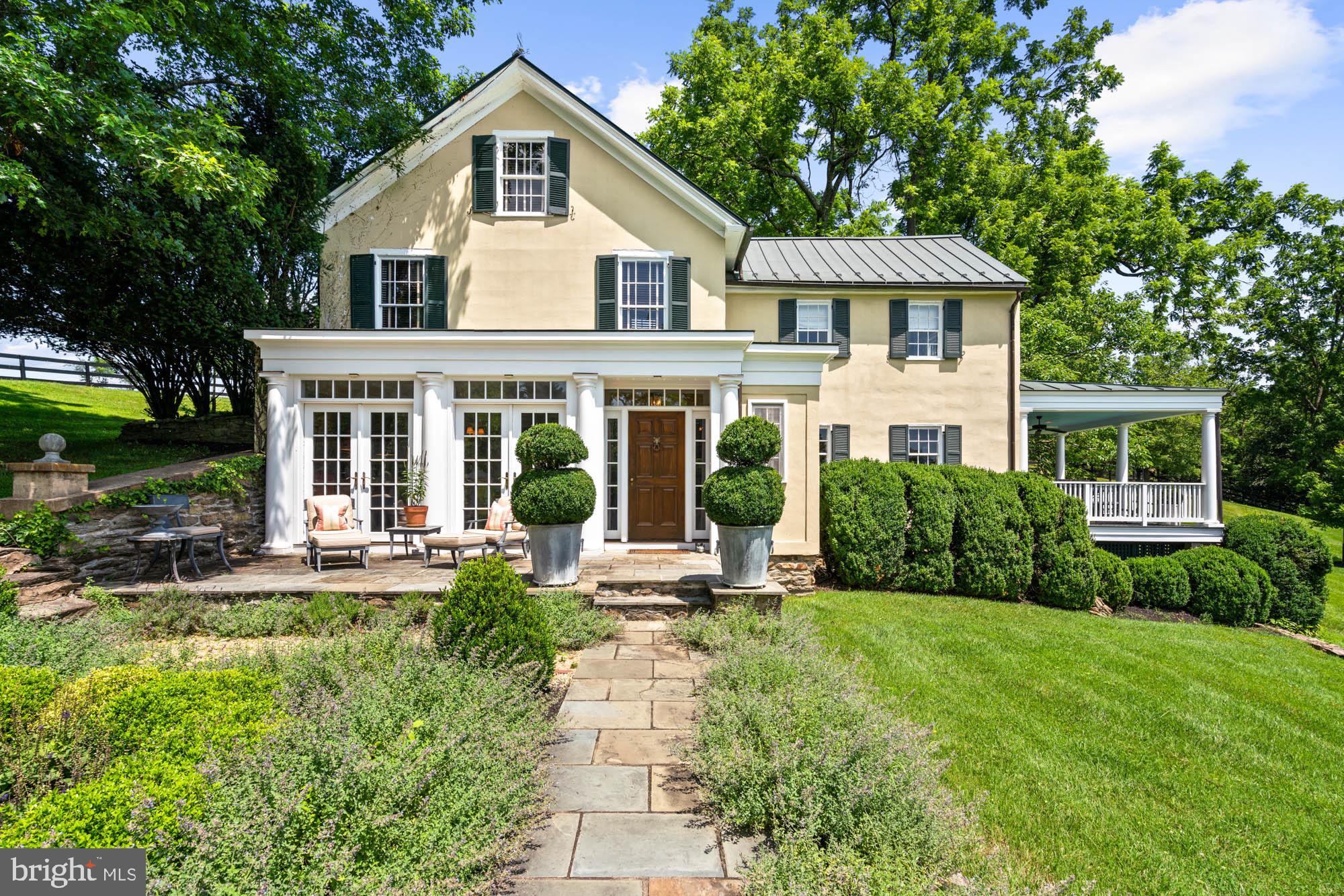For the first time in nearly 30 years, Boxwood Glen, a distinguished country estate dating to 1870 in the heart of Virginia Hunt Country, is offered fully furnished and turnkey.

Gracefully evolved over time, the residence reflects a thoughtful balance of heritage and refinement. A newly designed marble kitchen anchors the home, while four bedrooms, stone fireplaces, and a series of terraces open to sweeping, private views, creating a setting equally suited for intimate living and elegant entertaining.

A tree lined drive reveals a pea gravel motor court and a separate 12 stall barn with rental potential, completing a property that is as functional as it is beautiful.

Location remains paramount. Just 10 minutes from Middleburg’s Main Street, Boxwood Glen is not merely a residence, but a rare retreat where history, landscape, and timeless design come together with quiet sophistication.