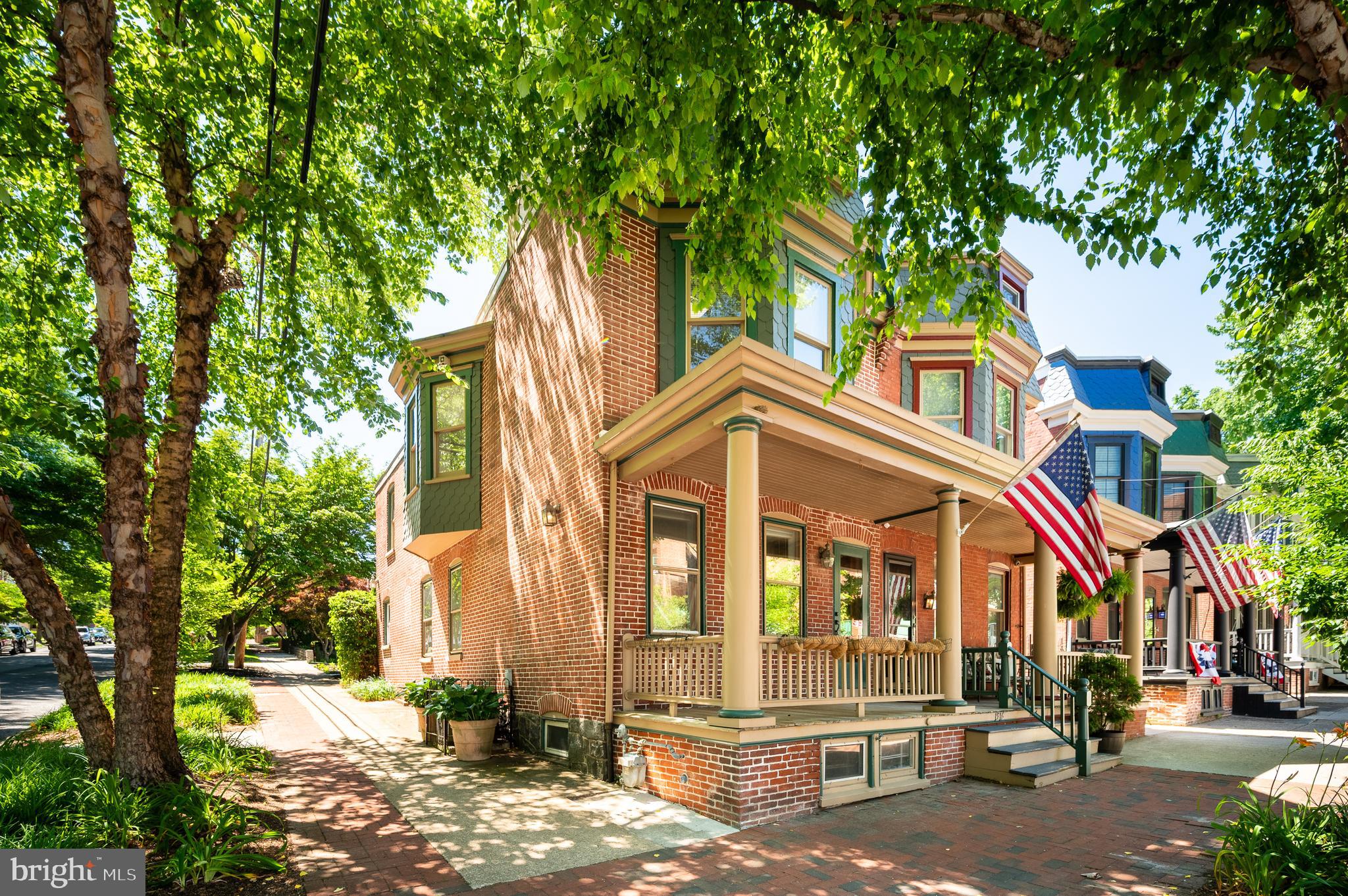 Welcome to 1516 N Clayton Street in the heart of Trolley Square and just across the street from Brandywine Park and the Rodney Street tennis courts.  Easily park your car on Gilpin, enter through the private entrance into your backyard oasis right into your kitchen!  Life couldn't get more convenient.   Upon entering this fine home you will first notice stunning exposed brick wall, wood floors throughout, spacious and open floor plan that is versatile for the way you live.   Loads of natural light team through the entire first floor creating a super environment.   Kitchen with breakfast bar is open to great room, is full of cabinets and new granite counters together with stainless steel appliances (new range and dishwasher).   Convenient powder room is located off the kitchen.  Step through the sliding glass doors into your back yard oasis, a tranquil setting, perfect for entertaining. Lower level is finished, ideal for exercise room or home office and is graced with exquisite exposed stone accent wall.  Bedroom level features two private bedrooms, with excellent closet space, good natural light, more wood floors.  A large open space/loft is centrally located and could be converted back to a third bedroom though makes a perfect home office or nursery.   This home was meticulously gutted and rebuilt by careful prior owner in the mid 90s, and painstakingly cared for thereafter, in great condition with solid mechanical systems.  Ground wiring electrical system, natural gas radiant heat and central air conditioning, the best of both worlds.   A pre listing home inspection and termite report are available.  Don't miss this opportunity to make 1516 the place you call home!