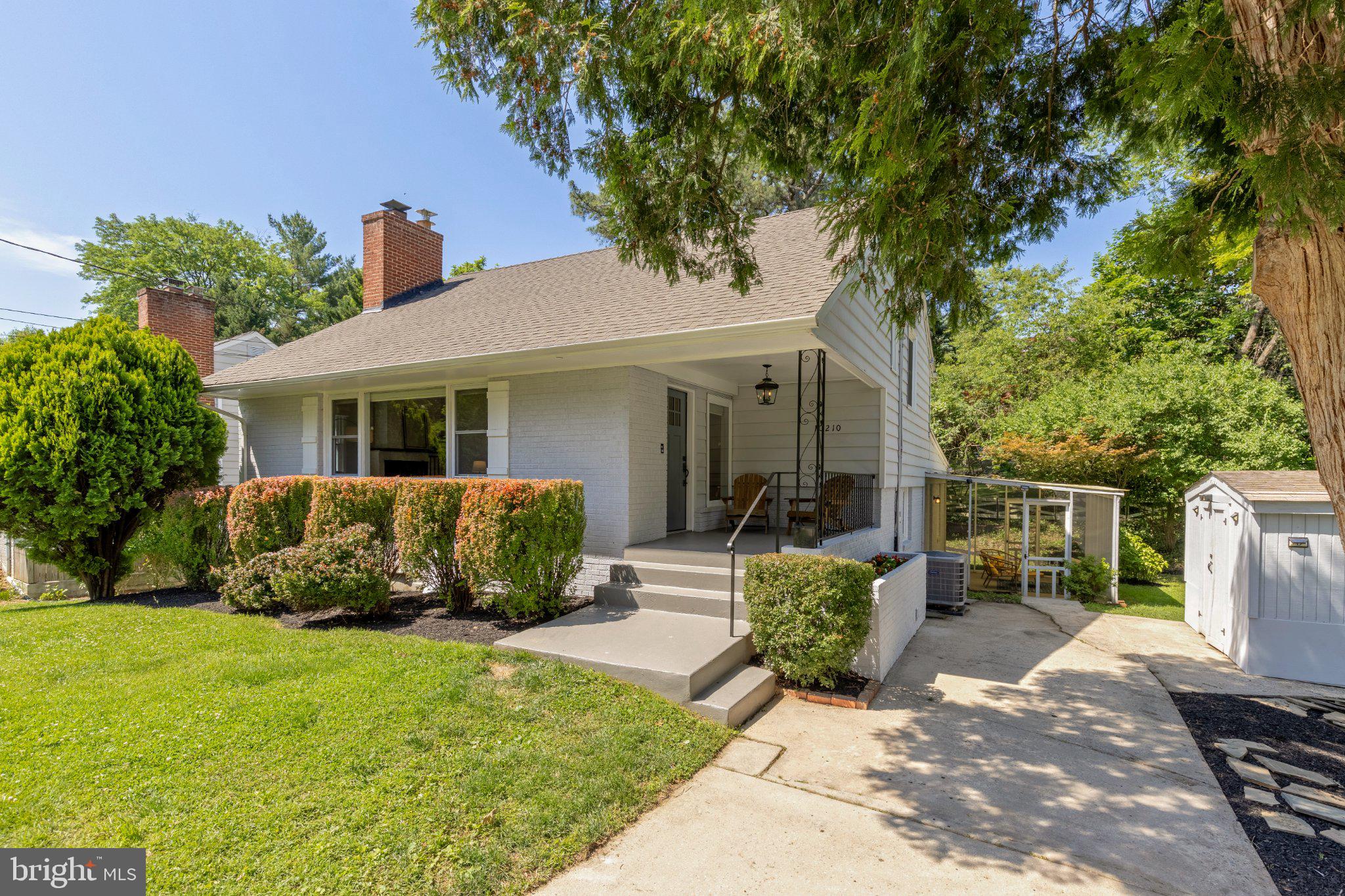 New to Market. This historic Kensington home recently underwent a top-to-bottom renovation, and the attention to detail is obvious the moment you step inside. Again freshly painted and with the hardwood floors refinished and new carpet, this home is ready for your vision.  The main living space perfectly balances classic charm with modern living, keeping original details like the wood-burning fireplace alongside original and refinished hardwood floors and brand-new windows.

The back of the house is where you will spend most of your time. The large kitchen was entirely redesigned with quartz countertops, stainless appliances, and lots of cabinet space.  There is a breakfast bar perfect for barstools and and it all flows right into a bright family room. Nearby, a separate dining room is perfect for large dinner gatherings, comfortably seating eight.  From there, you walk out onto a completely refinished screened-in porch, the perfect spot to relax without dealing with bugs. On the other side of the living room is a deck accessed through a beautiful sliding glass door that overlooks a beautifully landscaped, deep yard and manicured grounds.  It feels like a private oasis.

Upstairs, there are three bright bedrooms and an expanded and gorgeous main bath with a double vanity and plenty of storage. The lower level offers great flexibility with a fourth bedroom and full ensuite bath, making it perfect for in-laws, guest space, or a quiet home office. Plus there is a main-level laundry room with a powder room tucked away and easily accessible.

The location is about as convenient as it gets and the setting is serene and not on a main road. Commuters will love the fact that it is an easy, flat, five-minute walk straight to the Kensington MARC train station. You are also sitting right across from the historic Noyes Children's Library and just steps from the local shops and restaurants along Antique Row, with quick access to I-495 and the Metro.