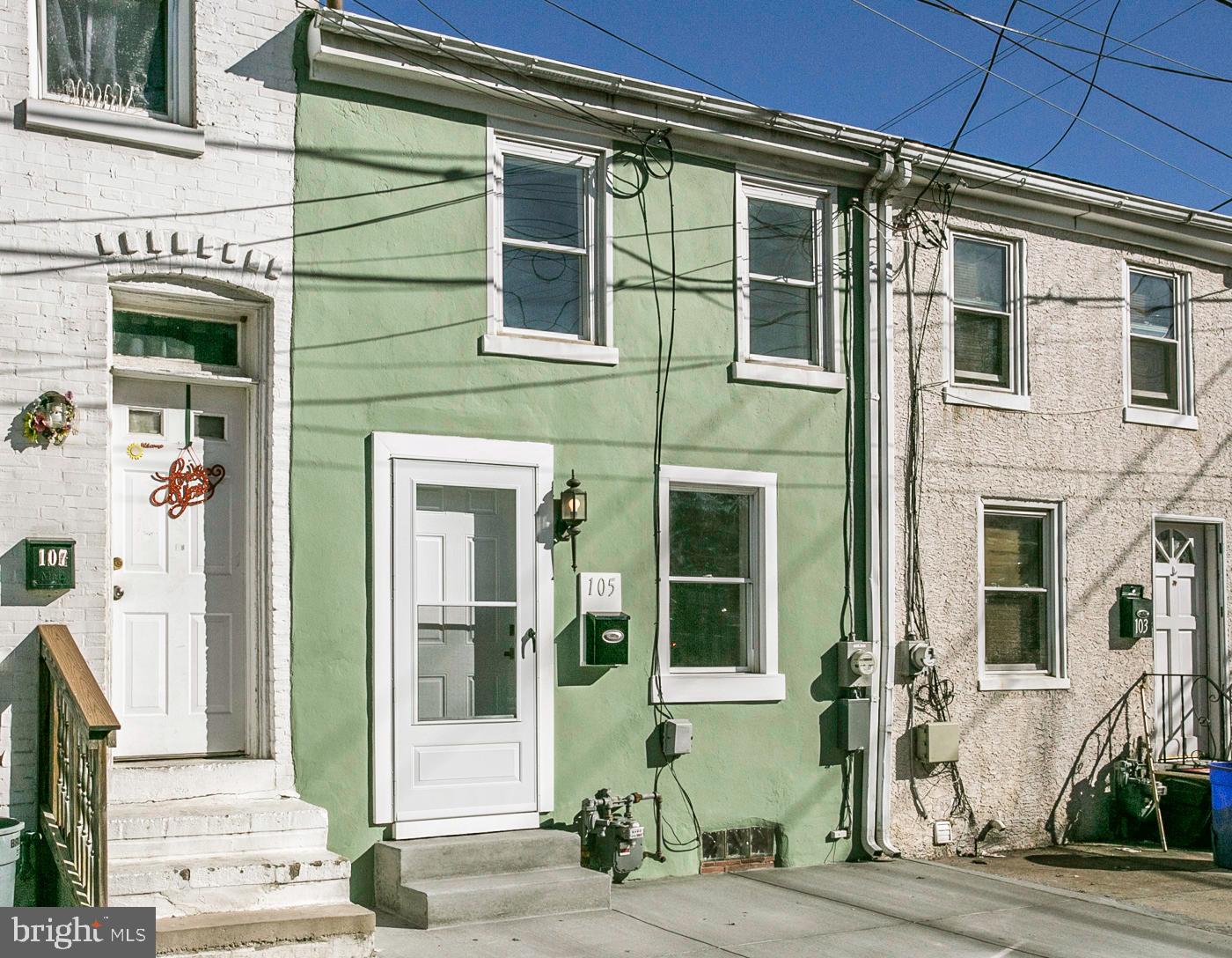 Welcome to this well maintained and updated row home in the heart of Bridgeport Borough. Conveniently located to transportation and walking distance to town, shopping and restaurants.  The front of the home greets you with a freshly painted exterior and new sidewalks just done in winter of 2024.  Enter the bright living room with beautiful hardwood floors that flow into the dining room area.  Kitchen has been updated (2023) with tile flooring and quartz countertops. Kitchen exits to rear patio area that is fenced in. Great area for relaxing and entertaining. Full bathroom also updated in 2023. Upstairs has two nice sized bedrooms with new neutral carpets. The basement is a great space to use for laundry and lots of additional convenient storage. New heater/boiler, hot water heater and electric service in 2021.