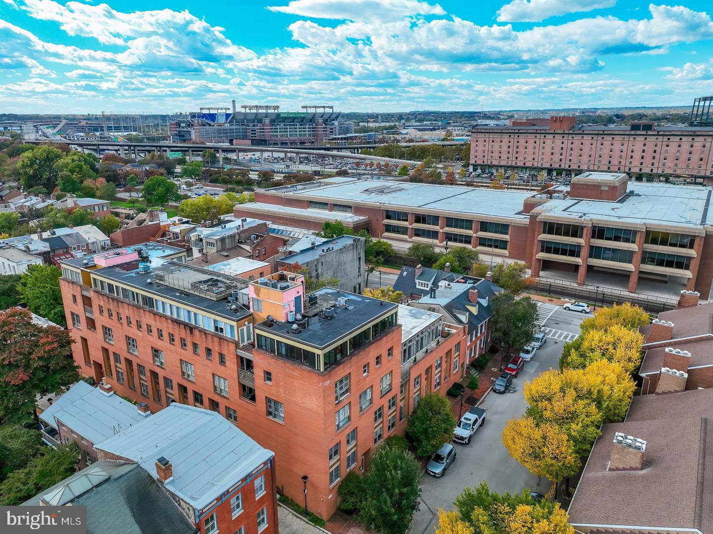 Perched above historic Otterbein, this 2‑bed, 2‑bath penthouse blends city convenience with quiet, cobblestone‑street charm. Step inside to a light‑filled layout with granite countertops throughout, stainless steel appliances, and an in‑unit washer/dryer. Both bedrooms frame sweeping city views, while the primary suite features built‑ins and a large walk‑in closet. Bathrooms include a recently updated shower with timeless finishes.

Your private outdoor retreat awaits: a spacious balcony—perfect for morning coffee or sunset toasts—plus an additional community rooftop terrace, all showcasing picture‑perfect views of Downtown Baltimore. The secure, well‑managed building offers 24/7 key‑fob access, a dedicated storage unit, and covered assigned parking plus visitor parking (2 spaces).

Live moments from M&T Bank Stadium, Oriole Park at Camden Yards, the Inner Harbor, and Federal Hill—along with some of the city’s best restaurants, parks, and pocket gardens. Commuters will love quick access to I‑95/295, the MARC Train, and Light Rail.

This is city living done right— skyline views and an A+ location in a sought‑after neighborhood. FHA approved community (buyer to verify). Schedule your tour of PH‑3 today.