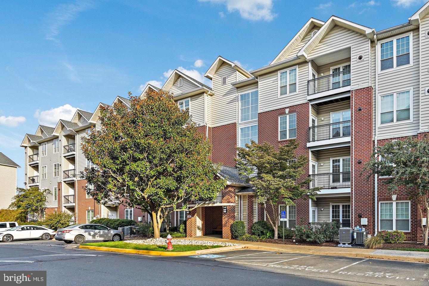 Tucked within the gated community of Gates of McLean, this beautifully maintained 1-bedroom, 1-bath condo offers great amenities and close proximity to all that Tysons has to offer! Thoughtfully updated with a new HVAC and hot water heater (2025) plus a newer dishwasher (2022), this move-in ready home features an open, light-filled layout. The living area flows seamlessly to a private balcony overlooking a community courtyard. The generously sized bedroom includes a walk-in closet and large full bathroom. Added convenience with full-size in-unit washer and dryer and one assigned underground garage parking space with elevator access! Residents of Gates of McLean enjoy resort-style amenities including a pool, fitness center, sauna, clubhouse, walking paths, basketball court, and beautifully landscaped grounds. Perfectly positioned in the heart of Tysons’ sought-after “Golden Triangle,” you’re just steps to the McLean Metro, Wegmans, Capital One Hall, world-class shopping, dining, and entertainment. With quick access to I-495, I-66, the Dulles Toll Road, and DC, this location offers unbeatable connectivity and lifestyle in one of Northern Virginia’s most dynamic communities.