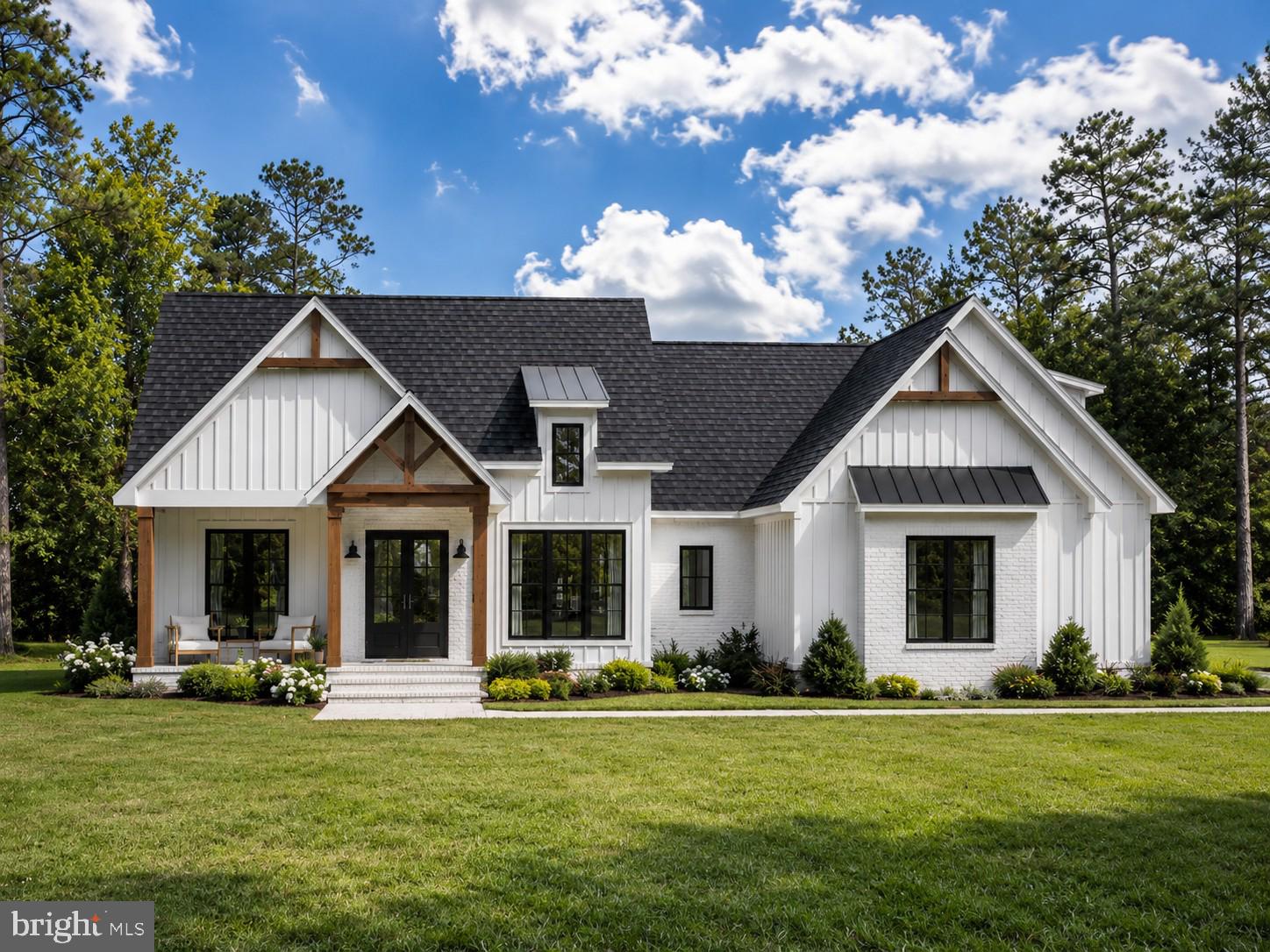 Follow your private  driveway to this to be built modern farmhouse, located in the prestigious Waterside Reserve community situated on a stunning 9.5 acres with a small pond .  This community has access to the scenic Shenandoah River and offers a serene retreat just 5 minutes from downtown historic Charles Town. Only 2 minutes from Rt. 115, a major commuting route to Northern Virginia and Suburban Maryland, this estate is the perfect blend of rural tranquility and convenient access.
ou're looking for peace and privacy or a place to gather and entertain, this outdoor space offers it all.
The side-entry two car garage provides ample space for vehicles and storage, perfectly complementing the thoughtful layout of the home. The builder has thought of everything!  
Located in an upscale community with Shenandoah River access, this property offers the best of both worlds—quiet country living within close proximity to essential amenities and major commuting routes. It’s truly a one-of-a-kind opportunity to live in luxury while embracing nature and convenience. 
Picture is of a similar construction and is to be built.
