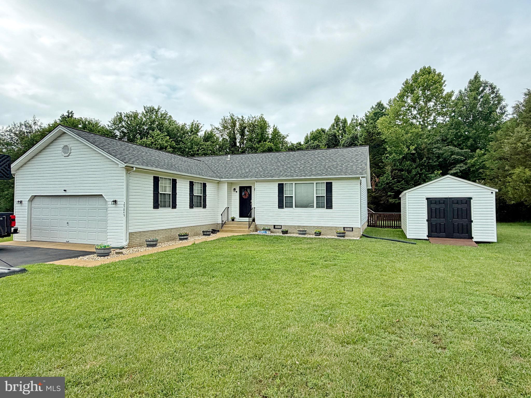 This well-maintained 3-bedroom, 2-bath rambler features a comfortable one-level layout, including a primary bedroom with a private full bathroom. The kitchen offers quartz countertops, stainless steel appliances, and plenty of workspace for everyday living and entertaining.
Major updates include an HVAC system installed in 2018, a roof replaced in 2020, and appliances updated in 2018. Additional highlights include an attached two-car garage with automatic opener and a dehumidifier in the crawlspace. Outside, enjoy a fully fenced backyard with plenty of room and two storage sheds.