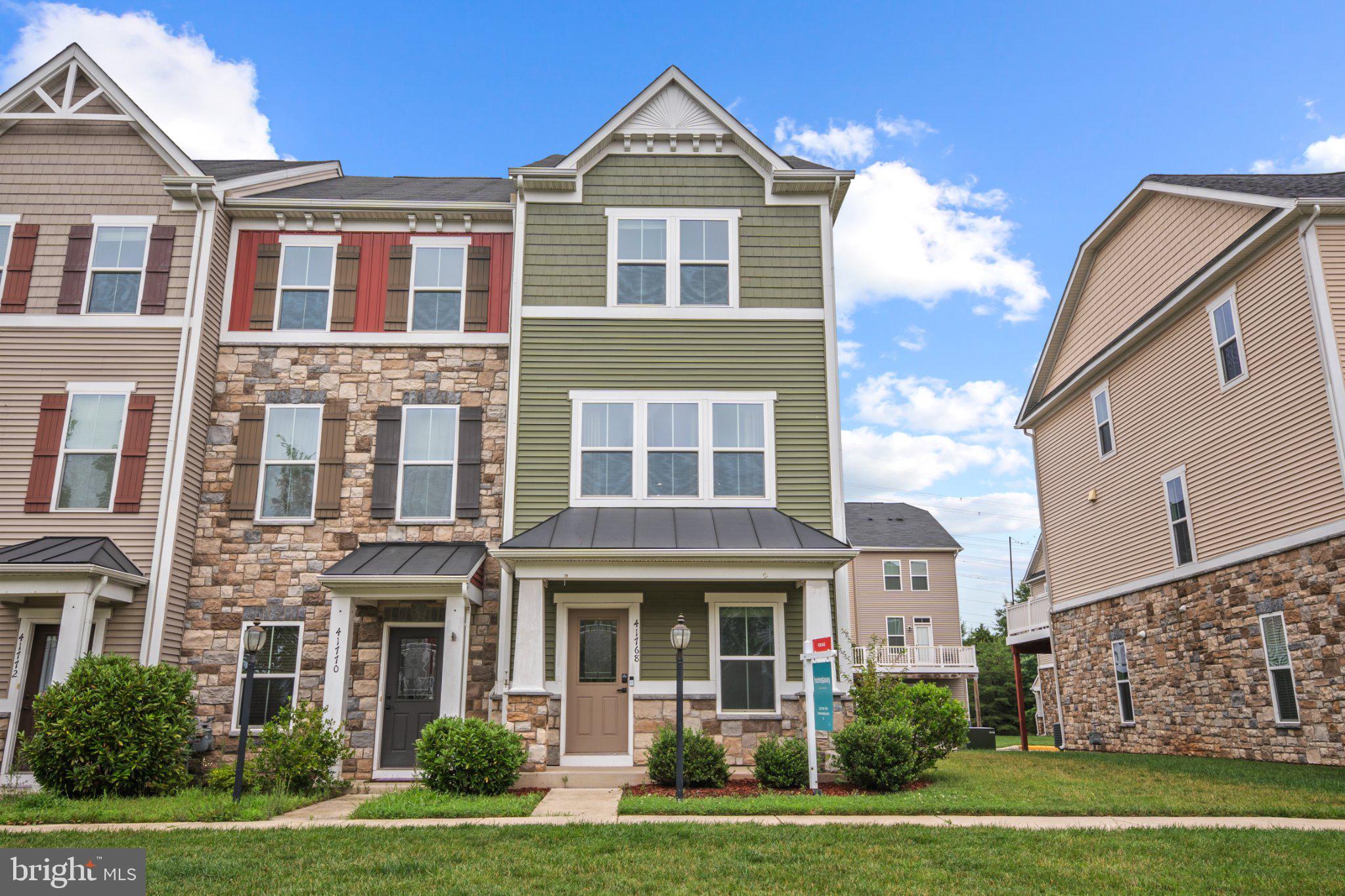 Welcome home to this beautifully maintained end-unit townhome in the sought-after Westridge community! Sunlight pours through extra end-unit windows, spilling across rich hardwood floors and an open-concept main level made for both quiet evenings and easy entertaining. The gourmet kitchen is the heart of it all — granite countertops, stainless steel appliances, and a layout that flows right out to your deck, perfect for morning coffee or weekend grilling.

Upstairs, the primary suite offers a true retreat with its own full bath, while a versatile loft-level bedroom with a full bath and walk-in closet gives you flexible space for guests, a home office, or whatever life calls for next. With four finished levels, there's room to spread out, and the oversized one-car garage means storage is never a struggle.

And here's the bonus most buyers don't realize: unlike some townhomes in the area that sit under a condo association (meaning a separate condo fee stacked on top of HOA dues), this home is true fee-simple ownership under a single HOA — so you get all the same resort-style perks without paying twice for them.

Beyond your front door, Westridge delivers a clubhouse with pool and fitness center, tennis courts, walking trails, tot lots, and ponds, all just minutes from shopping, dining, and major commuter routes.

This one has the space, the finishes, and the location. Come see it for yourself!