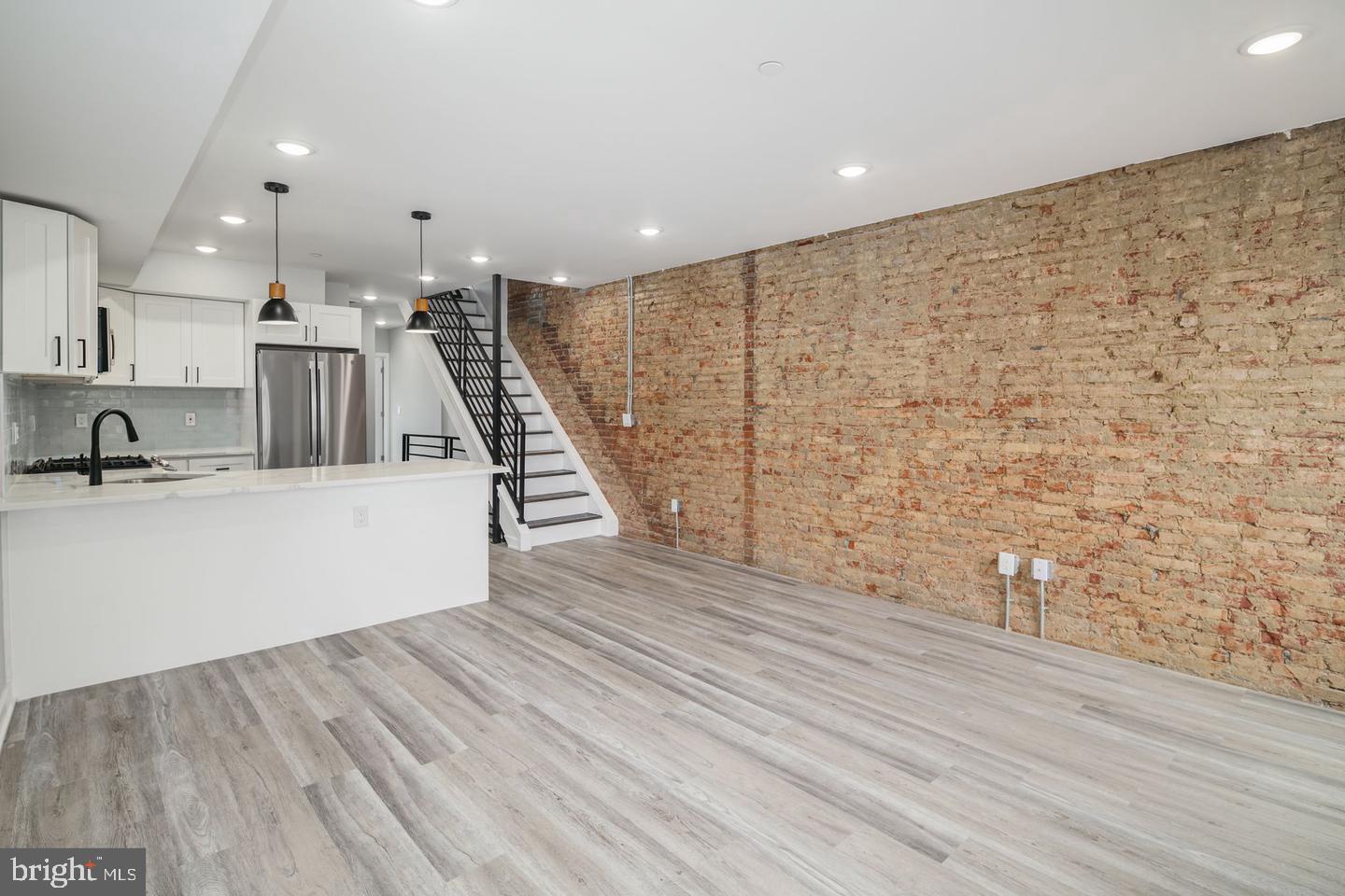 NEWLY renovated  2nd floor unit available for rent. This unit was perfectly designed with an  open living room/dinning room/kitchen area, 3 bedrooms/3 bathrooms, each with generous closet space, and an amazing rooftop. with unobstructed city views. This entire property was meticulously updated by the owner and includes new HVAC, electric, plumbing, windows, and much more. This unit is located one block awat from Broad Street and within walking distance to all of South Philadelphia/Center City has to offer. Tenant responsible for all utilities.