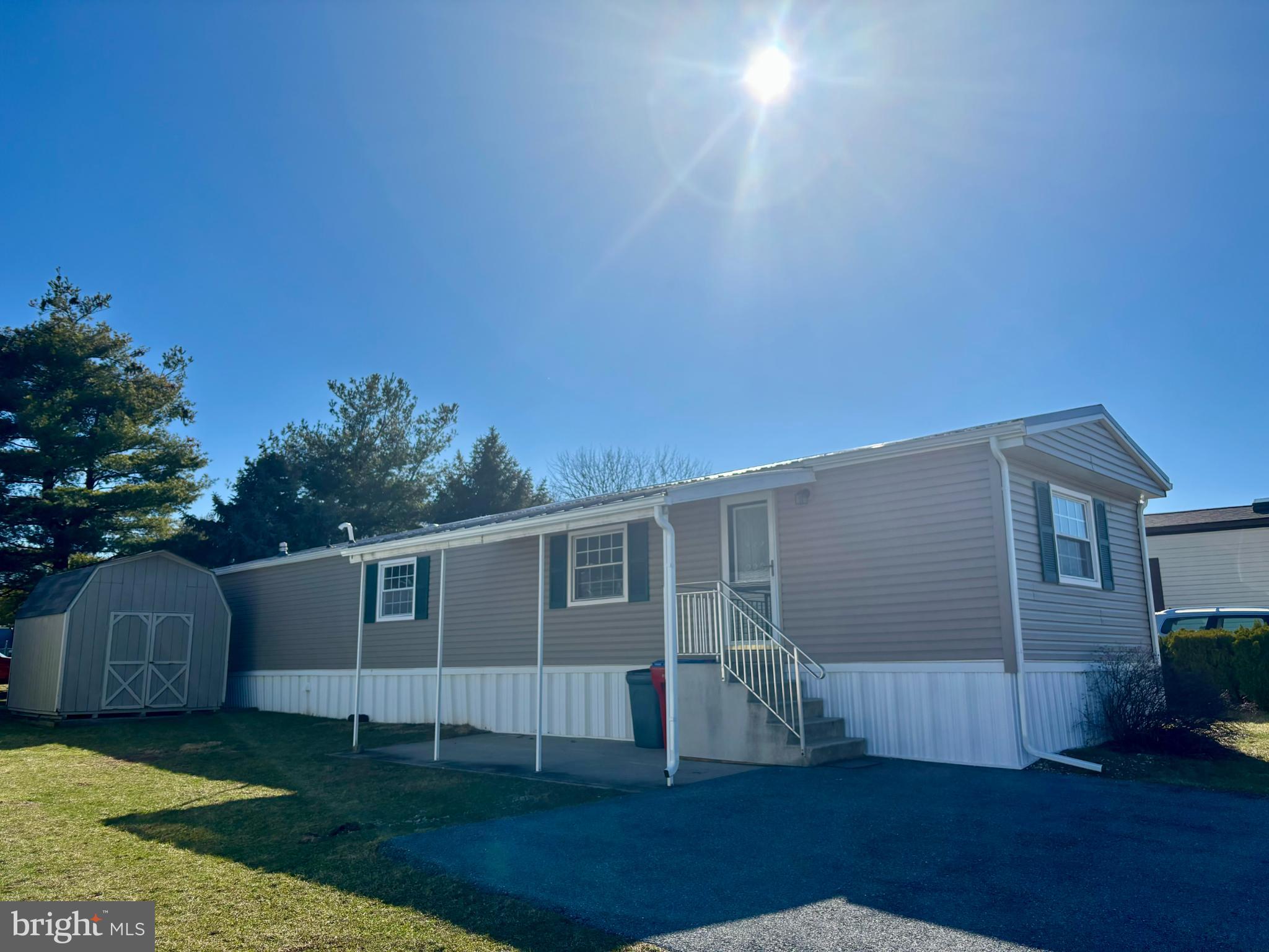 This charming 2-bedroom, 1.5-bathroom manufactured home in Laurel Commons offers a perfect blend of comfort and functionality. Built in 1990, the traditional design features durable aluminum siding and inviting laminate plank flooring throughout. The spacious living area is enhanced by ceiling fans, ensuring a cozy atmosphere year-round. The well-appointed kitchen comes equipped with essential appliances, including a single oven, dishwasher, microwave, washer, dryer, and refrigerator, making meal prep and laundry a breeze. Enjoy the convenience of in-unit laundry, allowing you to manage your chores effortlessly. With a total of 980 sq. ft. , this home provides ample space for relaxation and entertaining. The property includes a shed for additional storage and offers on-street and driveway parking for your convenience. Located less than 10 miles from the Reading airport, this home is ideally situated for easy travel. Experience the warmth and comfort of this delightful residence, perfect for creating lasting memories. *Bring an offer.