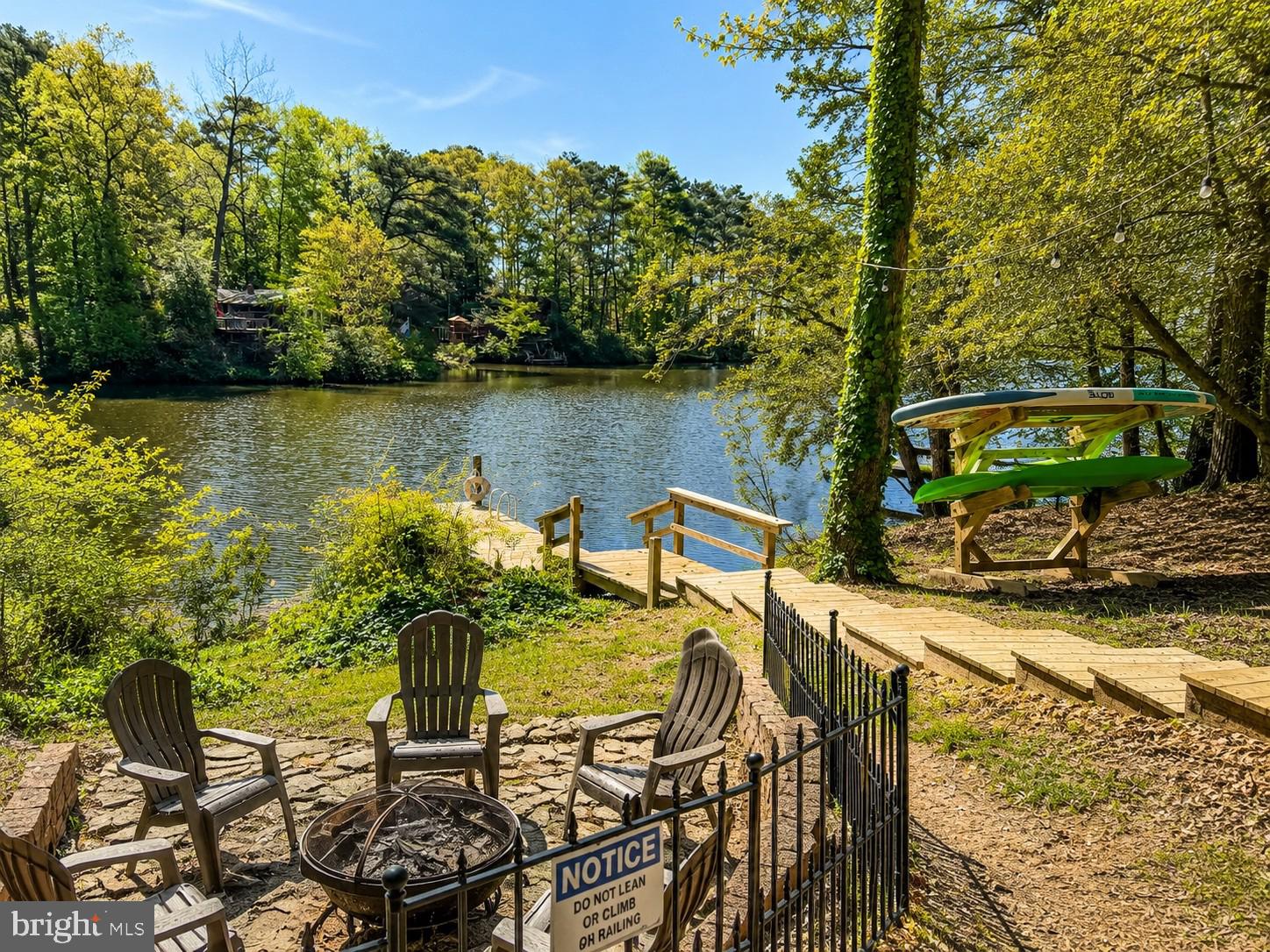 Welcome to Lake front living with this one of a kind home located on Lake Vista. Offering 3 nice sized bedrooms and 3 stunning bathrooms this is just the beginning. From the moment you walk in the door you will see the amazing attention to detail these owners took when renovating a few years ago. Views of the lake from the family room is a nice touch even better is relaxing on your very own screened porch with views of the water. This home was built to enjoy from the finished basement, the hot tub, firepit lake side or the pier in the tidal waters of the lake. You can enjoy paddle boarding, canoeing, fishing or taking in the views of the Bay from your own pier. The interior is just simply stunning and no detail has gone untouched.  Located in desirable Drum Point this home also offers a community beach and you can take a stroll from your home to the bay and fish off the rocks. This home also offers a nice 2 car garage and ample parking.  This certainly is one you will want to see as it is not only stunning it is ready for you! Currently an airbnb so please no drivebys. We will have more pictures of the exterior coming soon.