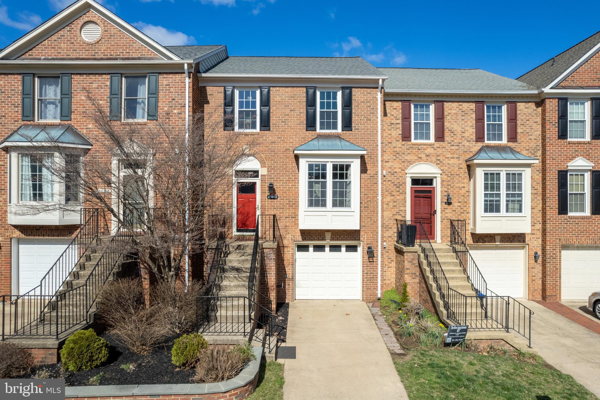 Welcome to 43408 Livery Sq, a beautifully updated townhome in the highly sought-after Ashburn Farm community. This 3 bedroom, 2 full / 2 half bathroom home offers a spacious and thoughtfully designed layout with fresh updates throughout. The main level features recently refinished hardwood floors and stylish updated lighting. A bump-out in the living room adds extra space and architectural interest. The gourmet kitchen boasts granite countertops, beautiful cabinetry, a moveable island, and stainless steel appliances, with access to a maintenance free deck overlooking serene green space. The upper level features a sun-filled hallway to the primary suite with vaulted ceilings, a large walk-in closet, and a spa-like bathroom with a luxurious shower. Two additional bedrooms and a hall bath that impresses with a beautiful vanity and marble flooring complete the upper level. The fully finished lower level offers a versatile space with a cozy gas fireplace, an updated laundry room, and a half bath. The fenced backyard with brick paver patio and grass provide a perfect outdoor retreat and the gate leads you to a wide open common area. This home includes a front-load garage with inside access, central heating and cooling, and community amenities, including pools, trails, and playgrounds. Conveniently located near shopping, dining, and top-rated schools, this townhome is move-in ready. Schedule your showing today!