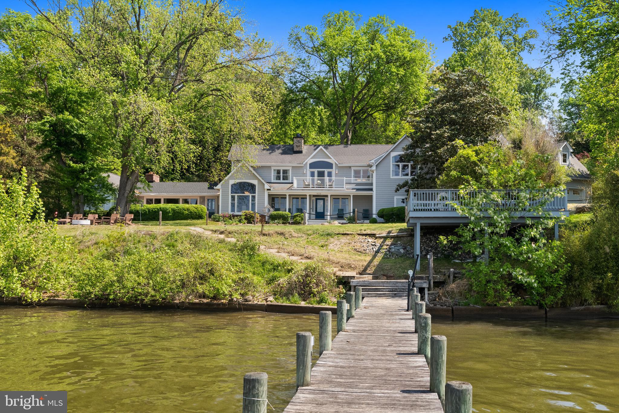 Set along the scenic Potomac River, this extraordinary 2.1+ acre waterfront estate in Fort Washington’s coveted Treasure Cove offers a rare blend of privacy, scale, and breathtaking natural beauty. With approximately 400 feet of shoreline, the property captures sweeping river views and unforgettable sunsets from nearly every vantage point.

A private dock and boat lift make it effortless to get out on the water whenever the moment strikes—perfect for embracing a true waterfront lifestyle.

The residence spans over 6,000 square feet, offering expansive and flexible living spaces ready to be enjoyed as-is or elevated to today’s modern standards. The dramatic family room features a fireplace and striking beamed ceilings, while formal living and dining rooms provide timeless spaces for entertaining. A generously sized kitchen anchors the home, presenting an excellent opportunity for customization.

The primary suite serves as a peaceful retreat, complete with a fireplace, oversized walk-in closet, spa-like bath, and a private deck overlooking the river—ideal for both sunrise coffee and sunset views.

Additional highlights include a library, a sitting room or artist studio, a second kitchen, four additional bedrooms, and three additional baths. A three-car garage with a finished upper level large enough for a couple of private offices, studio and more. Also on this level is large storage area with easy access.

For boating enthusiasts, the location is unmatched, with easy access by water to the vibrant waterfront destinations of National Harbor, Old Town Alexandria, Navy Yard, and Georgetown.

Conveniently located just minutes from National Harbor, Washington, DC, Old Town Alexandria, and major employment hubs, this is a rare chance to own a premier waterfront estate that combines lifestyle, location, and long-term potential—all just moments from the Nation’s Capital.