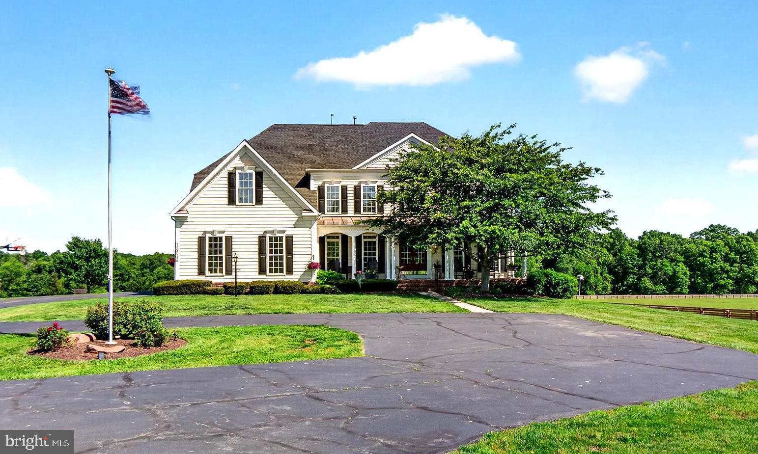 MAJOR PRICE IMPROVEMENT! Open SATURDAY (7/25) from Noon to 2pm! Welcome to one of the finest estate homes in the upcounty region, featuring 5+ generous bedrooms , five full baths, a main floor bedroom suite, and endless views! This 6500+ sq/ft country colonial is perfectly positioned on 6.5 acres acres in the the Ag Reserve's horse country and just a short drive to top-ranked Poolesville High School! Set in the premium Stoney Springs "big lot" neighborhood and surrounded by horse farms with direct access to riding trails, you will enjoy the covered front porch and expansive rear deck --- both are perfect entertaining, sunrises and stargazing!  This gem features hardwood floors on the main level, two staircases, the sought-after open floor plan, a two story great room with stone fireplace, and a modern kitchen with a custom island, quality cabinets, huge table space, and a deep walk-in pantry.  The main level bedroom is in it's own separated area with easy access to a full bath and it's own living room space. The upper level features a primary bedroom unlike any other --- tons of natural light from a wall of windows, room for your big screen and a quiet home office, plus a "must see" closet room (because just calling it a closet doesn't do it justice!). Check out the photos! All upper level bedrooms (especially the primary suite) are generously sized and purposefully designed to provide privacy.  Of course, there is an en-suite bedroom with private bath for guests or that favorite sibling ,and also a full-sized bedroom-level laundry room! Down to the lower level,  the recreation room seems to go on forever with a walk-out to your incredible backyard, plus a full bath and a big media room currently being used as yet another bedroom! Tons of storage space with room for your private gym! Always updated and well-maintained, including new 30-year architectural shingle roof in 2021 and two-zone HVAC (2021, 2025). Minutes to the best of Poolesville---top-rated Poolesville High School, our community pool/splashpark, Crossvines Winery, Poolesville Golf Course, and downtown restaurants/shopping! NO HOA or Front Foot Fees! Work from home with ultra high-speed FIOs or enjoy the short drive to 3 different MARC trains as well as Rockville, Gaithersburg, DC, Leesburg, and Frederick! Come join the fun in the best small town and award-winning school cluster in Maryland----Poolesville! Listing agent will always be available to answer any questions and will be happy to show your pre-qualified clients the property for you.