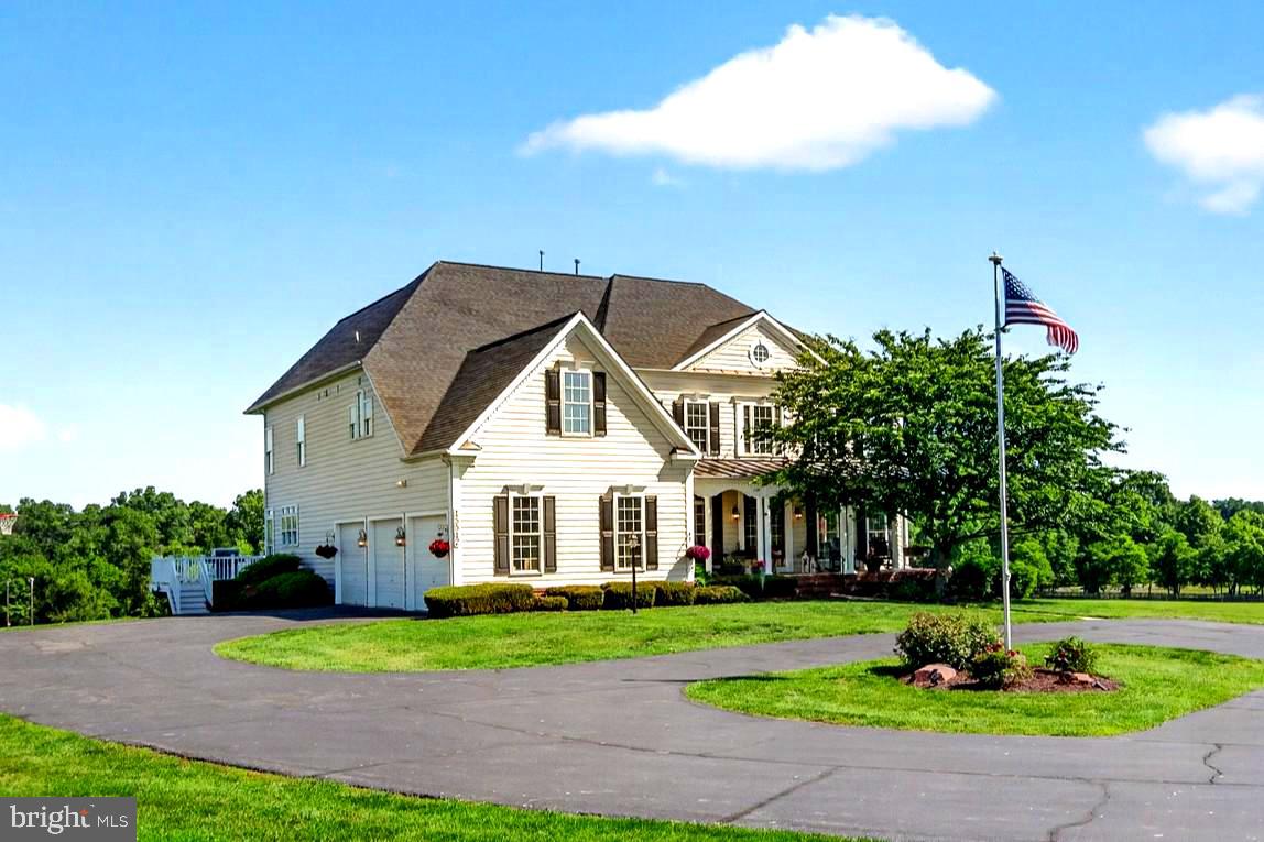 NEW LISTING! Open Saturday (6/20) 12-2 PM and available all weekend for scheduled showings! Welcome to one of the finest estate homes in the upcounty region, featuring 5+ generous bedrooms , five full baths, a main floor bedroom suite, and endless views! This 6500+ sq/ft country colonial is perfectly positioned on 6.5 acres acres in the the Ag Reserve's horse country and just a short drive to top-ranked Poolesville High School! Set in the premium Stoney Springs "big lot" neighborhood and surrounded by horse farms with direct access to riding trails, you will enjoy the covered front porch and expansive rear deck --- both are perfect entertaining, sunrises and stargazing!  This gem features hardwood floors on the main level, two staircases, the sought-after open floor plan, a two story great room with stone fireplace, and a modern kitchen with a custom island, quality cabinets, huge table space, and a deep walk-in pantry.  The main level bedroom is in it's own separated area with easy access to a full bath and it's own living room space. The upper level features a primary bedroom unlike any other --- tons of natural light from a wall of windows, room for your big screen and a quiet home office, plus a "must see" closet room (because just calling it a closet doesn't do it justice!). Check out the photos! All upper level bedrooms (especially the primary suite) are generously sized and purposefully designed to provide privacy.  Of course, there is an en-suite bedroom with private bath for guests or that favorite sibling ,and also a full-sized bedroom-level laundry room! Down to the lower level,  the recreation room seems to go on forever with a walk-out to your incredible backyard, plus a full bath and a big media room currently being used as yet another bedroom! Tons of storage space with room for your private gym! Always updated and well-maintained, including new 30-year architectural shingle roof in 2021 and two-zone HVAC (2021, 2025). Minutes to the best of Poolesville---top-rated Poolesville High School, our community pool/splashpark, Crossvines Winery, Poolesville Golf Course, and downtown restaurants/shopping! NO HOA or Front Foot Fees! Work from home with ultra high-speed FIOs or enjoy the short drive to 3 different MARC trains as well as Rockville, Gaithersburg, DC, Leesburg, and Frederick! Come join the fun in the best small town and award-winning school cluster in Maryland----Poolesville! Listing agent will always be available to answer any questions and will be happy to show your pre-qualified clients the property for you.