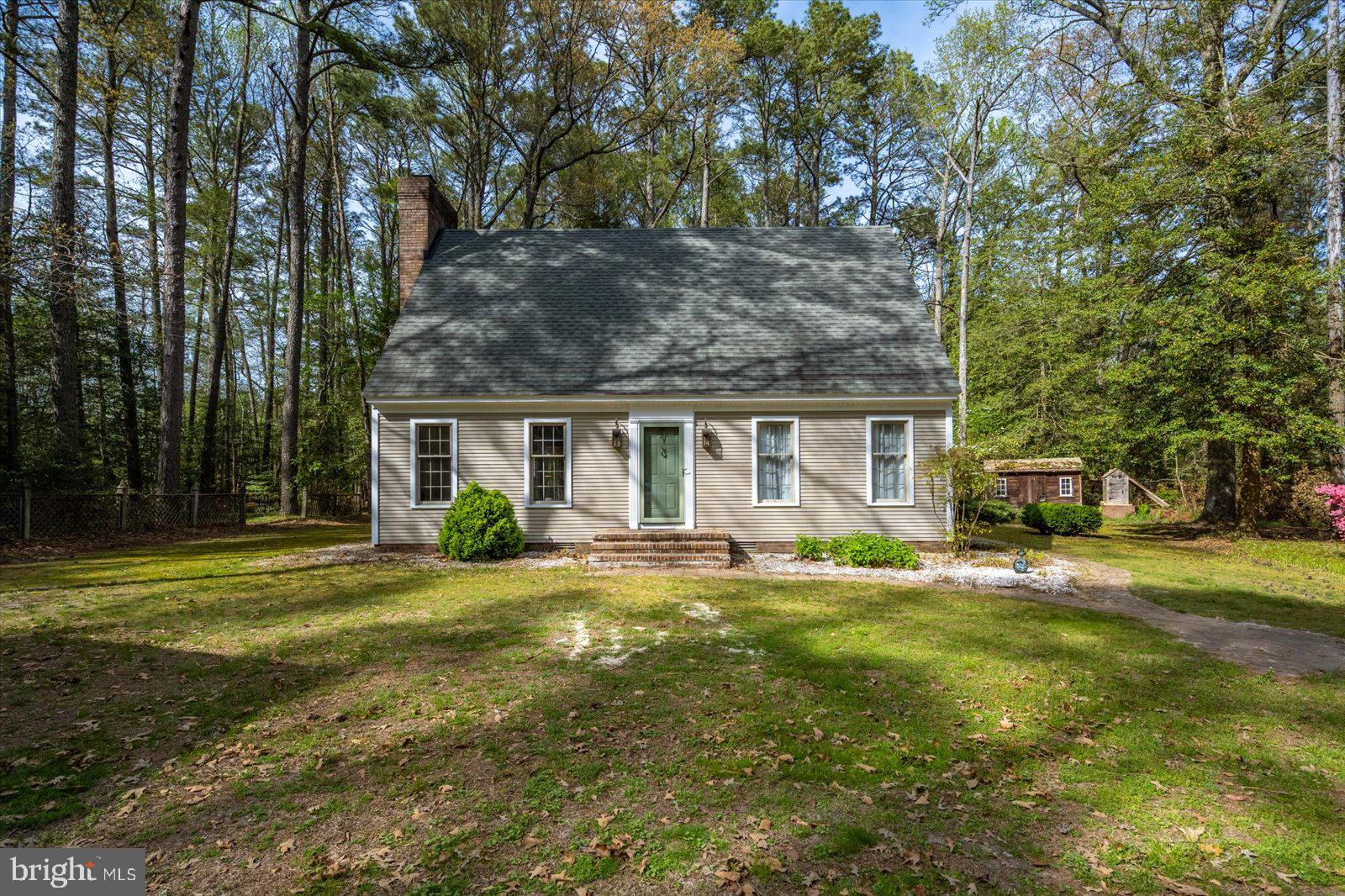 If peace, privacy, and a deep connection to nature are what you’re after, this property delivers. Nestled on just over 10 acres and backing to protected Nature Conservancy land, this home is surrounded by woods and abundant wildlife—whitetail deer, wild turkey, songbirds, eagles, foxes, and more. For hunting enthusiasts, it’s a rare opportunity to step right out your door and into your own private grounds.
Inside, the home offers three spacious bedrooms, including a primary suite with a fireplace and walk-in closet. The main level features a gourmet kitchen with custom cabinetry and granite countertops, a formal dining room, and a cozy living room with a brick fireplace. A standout feature is the custom-built bar—perfect for entertaining. At the rear, a window-lined family room brings the outdoors in, offering year-round views of the surrounding landscape.
The property is equally impressive outside. A 30' x 50' garage with paved flooring and electric provides ample space for vehicles and equipment. A separate 19' x 24' "Woodshop" building with Heating/Air Conditioning, that is insulated and has its own 200 amp electrical service, which offers flexibility as a home office, gym, or quiet retreat. There’s also a pole building for additional storage—ideal for a boat, RV, or tractor. A few acres of open field provide space for recreation, pets, or hobbies.
Set back along a long private drive, the home is hidden from the road, offering exceptional seclusion with only a few nearby neighbors. Conveniently located just off Maryland Route 12 near Snow Hill and Salisbury, you’ll have easy access to town while feeling worlds away.
This property was under contract, but the buyer was unable to complete the contract, so it is back on the market, so your opportunity is now.