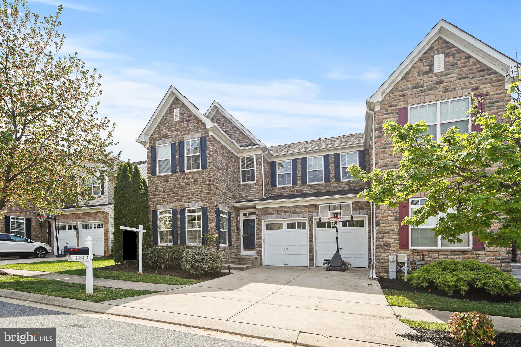 Welcome to your dream home in the highly sought-after Orchard Meadows neighborhood in Perry Hall! This beautiful stone front home features over 4000 sq. ft. of finished living space with 5 bedrooms and 3.5 bathrooms- providing ample space for comfortable, modern living. Step inside to hardwood floors that flow past the office ( which could also be a play room or exercise room), through a  bright formal dining room and continue into the large, sun filled kitchen. The kitchen is a chef’s delight, featuring upgraded appliances , generous space for a kitchen table, an oversized pantry and an abundance of natural light!  The open-concept floor plan extends into the cozy family room, likely to be everyone’s favorite hangout. A stunning stone gas fireplace serves as the heart of the space, perfect for gathering on chilly winter nights. A bonus room sits off of the family room that could serve as a play room, a home gym OR a second office for those who work from home! This amazing floor plan also has a powder room, a large laundry room AND an attached 2-car garage that you can access from the inside of the home.  Step outside to one of the home’s highlights—a well-built deck that offers plenty of room for grilling, entertaining, and relaxing! The scenic fenced in backyard offers year-round beauty and serenity, making outdoor living just as enjoyable as the indoors. Upstairs, you’ll find four spacious bedrooms, including a luxurious owner’s suite with a walk-in closet, a large 2nd closet, deep soaking tub, separate stand-up shower, and dual sinks. The hall bathroom features a convenient tub/shower combo, and three additional well-sized bedrooms with big closets round out the upper level. The finished lower level adds even more living space with a huge recreation area, a large bedroom including a st, a full bathroom with tub/shower combo AND a walk-out glass slider that fills the room with light. There is also an unfinished portion of the basement that is ideal for storage. Key Updates: Hardwood flooring 2019, water heater 2020, dishwasher 2021, stove 2023, refrigerator 2023, washer /dryer 2024, carpet in owners suite 2025, painted garage 2025, new inside doors and knobs 2025. Ideally located just minutes from parks, shopping, dining, and I-95! This home truly has it all—comfort, style, space, and convenience. Don’t miss the opportunity to make it yours!