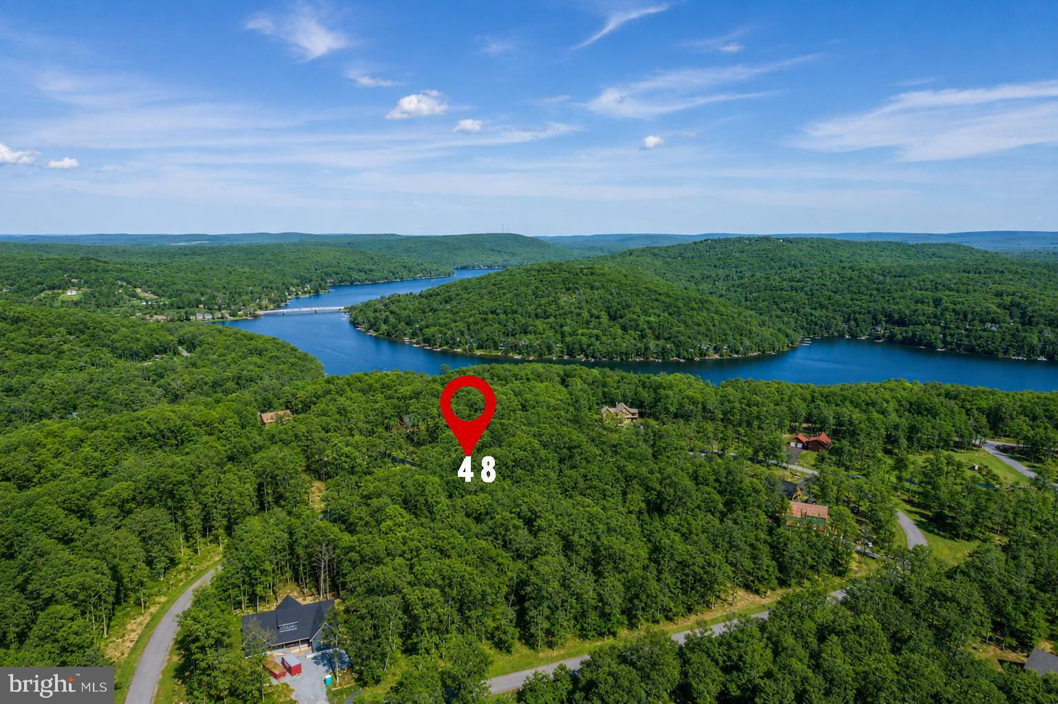 Ready to Build on Lot #48 in the desirable peaceful community "Sandy Shores Heights". Enjoy all  four seasons golfing at The Lodestone Golf Course, boating on Deep Creek Lake, fish or paddle the Yough River, hike/mountain bike/x-country in Fork Run and ski/golf Wisp Resort-all just minutes from your home.  Complete infrastructure system in place with utilities to site to include public water  & sewer hook ups, electricity, fiber optic lines/cable, underground propane & community compactor.  Live the dream-Call today!
DISCLOSURE: RAILEY REALTY IS NOT THE CARETAKER OF PROPERTIES LISTED BY IT.  DURING INCLEMENT WEATHER CONDITIONS, PURCHASERS AND THEIR AGENTS ASSUME ALL LIABILITY ASSOCIATED WITH OR BY WEATHER AT THE PROPERTY.