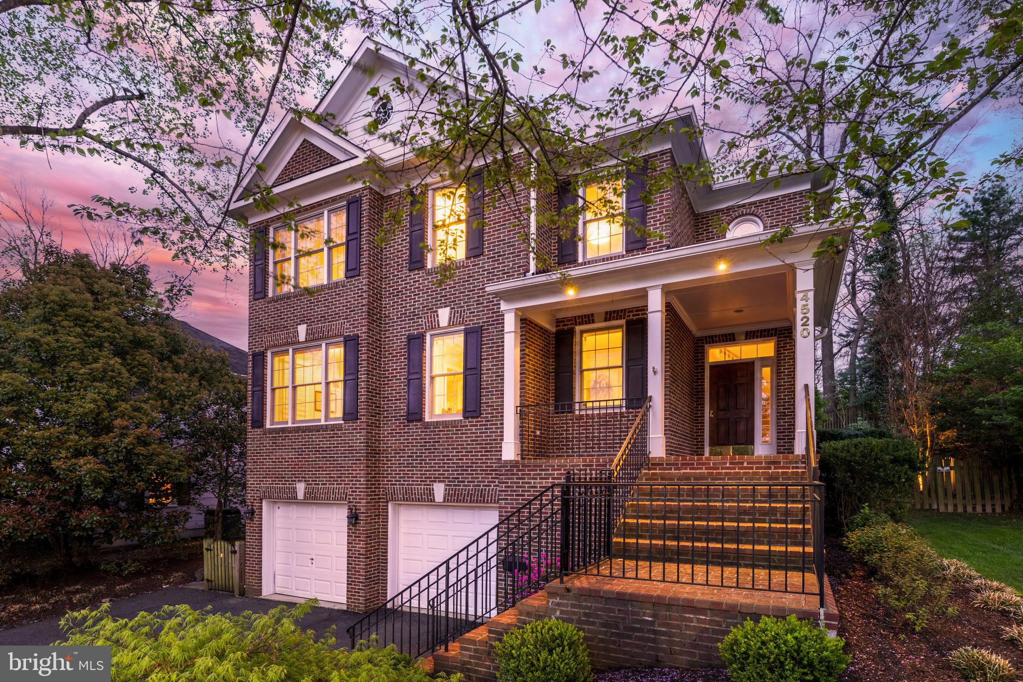 Welcome to 4520 Dittmar Road, an exquisite all-brick colonial nestled in Arlington's prestigious Country Club Hills community. This distinguished residence, built in 2001, offers six bedrooms and 4.5 baths across three meticulously finished levels. As you enter the grand two-story foyer, you're greeted by soaring ceilings and elegant crown molding. The main level boasts formal living and dining rooms, a private office, and a gourmet kitchen equipped with a spacious island, cooktop, dual wall ovens, and maple cabinetry. Adjacent to the kitchen, the expansive family room features built-in bookcases and a cozy gas fireplace, leading seamlessly to a beautifully landscaped backyard with a paver patio—ideal for outdoor gatherings. The upper level is highlighted by a luxurious master suite with a tray ceiling, dual walk-in closets, and a spa-like bath complete with a soaking tub, separate seamless glass shower, dual vanities with granite countertops, and a private toilet room. Additional bedrooms include a generous en-suite and two sizable rooms sharing a dual-vanity bath; a conveniently located upper-level laundry room adds practicality. The lower level offers a mudroom with built-ins for organization, two versatile bedrooms, a full bath, and a spacious recreation room. Situated on a private homesite, this property is just four blocks from the esteemed Washington Golf & Country Club at 3017 N Glebe Rd. The Country Club Hills neighborhood is renowned for its lush landscapes, spacious estates, and a strong sense of community, hosting events like block parties and an annual Fourth of July parade. Residents enjoy proximity to top-rated schools, upscale shopping, fine dining, and scenic parks. Commuters will appreciate the convenience of being approximately 3 miles from the Ballston Metro station and a short drive to Ronald Reagan Washington National Airport (DCA), facilitating effortless travel. This home seamlessly blends elegance, comfort, and an enviable location—truly a rare find in Arlington's real estate market.