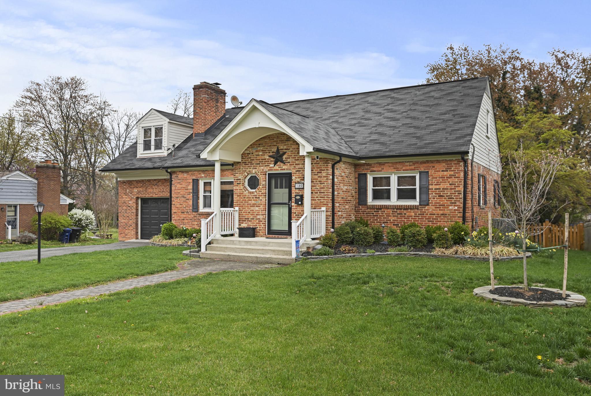 Welcome home to this beautifully renovated Cape Cod with over 3,600 SqFt of living space on all three levels, perfectly situated in the heart of historic downtown Leesburg on an expansive, meticulously landscaped and fully fenced backyard, complete with a convenient one-car garage. If you've been dreaming of the charm and convenience of downtown Leesburg living combined with modern amenities and ample space, your wait is finally over!

The home's inviting main level offers an upgraded kitchen, an expansive living room with wood-burning fireplace and custom built-in bookshelves, and a comfortable main-level bedroom complemented by a newly renovated full bath.

Step from the kitchen onto a spacious screened-in porch, the perfect retreat for relaxing and enjoying the tranquility of this charming neighborhood. From the porch, continue down to the inviting patio, providing an additional outdoor living space to savor the serene setting of your large private backyard.

Upstairs, you will find the primary suite complete with its own sitting room, full bath, and ample closet space. A thoughtfully designed addition boasting two additional generously sized bedrooms that share a renovated full bath.

The versatile lower level features yet another spacious recreation room with the home's second wood-burning fireplace, providing a cozy gathering area. Completing this level are an office, an additional flexible living space, ample storage, and another full bath.

Updates include: 2024 - Main Level Bathroom Renovation, New Bathroom Second Level, New Dishwasher, 2023 - New Refrigerator, 2022 - Stone retaining wall for flower beds, New Heat Pump,  2021 - Replaced Hot Water Heater, 2020 - New Stove, 2019 -  Refinish all original floors, 2018 - New Paver Patio, 2017 - Renovated Lower Level, 2015 - New Roof,  2014 - New Main HVAC,  New Front Walkway, 2013 - New Electrical Panel, 2012 - Upper Level Bedroom Addition, 2010 - New Screen Porch, 2005 - Front Entry Addition.