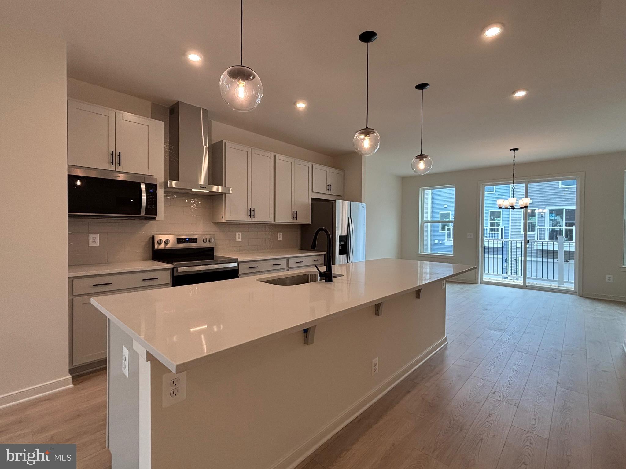 *NEW CONSTRUCTION* Special All-In Price, for June Move-In! Receive $20K in Closing Costs until 6/30 with a Choice Lender. See New Home Counselor for details. Hometown heroes get $5,000 until 6/30 (restrictions apply; see New Home Counselor for details). Step into the Potomac, a superior 3-level townhome with a 2-car garage in the sought-after Cascade Landing community in Dumfries, VA. This thoughtfully designed home offers 4 bedrooms and 3.5 baths, all with 9 ft. ceilings for an open, airy feel. The gourmet kitchen is a showpiece, featuring upgraded painted harbor cabinets, quartz countertops, ceramic tile backsplash, range hood, and stainless- steel Whirlpool appliances. Designer laminate flooring flows throughout the main level, including the kitchen, walk-in pantry, dining room and great room. A deck is off the main level to extend gatherings and relaxation. The luxurious primary suite includes a generous walk-in closet and a spa-inspired bathroom with raised double vanities, quartz countertops, and a shower with designer ceramic tile. A deck is off the main level to extend gatherings and relaxation. Plus, the garage includes an EV charger-compatible outlet, making this home future-ready. Enjoy low-maintenance living with affordable HOA dues (no hidden developer fees) so you can put your savings toward what matters most. Cascade Landing offers a welcoming neighborhood with a playground, easy walkability, and quick access to premier parks and trails. Located just 2 miles from Marine Corps Base Quantico (North Gate) and 2.5 miles from I-95, commuting is effortless. Commuters into DC and the surrounding areas will enjoy proximity to the Quantico Virginia Railway Express (VRE) Station (4.8 miles) and the Dumfries Commuter Lot with park and ride access (2.1 miles). Beazer Homes at Cascade Landing are designed to live better day to day, with energy‑efficient construction that lowers monthly utility costs, thoughtful design options that make personalization simple, and Mortgage Choice, where our top lenders help you compare options and save money on your home loan. This high‑performance home is built to lower your total cost of homeownership through reduced utility bills, durable materials, and high‑quality construction that minimizes long‑term maintenance costs. Beazer Homes is proud to be America’s #1 Energy‑Efficient homebuilder. Our FY25 average gross HERS score of 32 (38 excluding solar) was the lowest of the publicly reported scores among the top 30 U.S. homebuilders by volume identified by Builder Magazine’s Top 100 List (based on 2025 total closings). Get protection against rising energy costs without changing how you live. Every Beazer home is pre-wired for solar, making it easier and more affordable to add a renewable system when you are ready. Photos of actual home. Plus, you’re close to Fortuna Center Plaza, Locust Shade Park, and dining favorites and entertainment. Model Home Hours: Mon–Sun, 11 AM–6 PM. Use 17910 Alicia Avenue, Dumfries, VA 22026 for GPS directions. Please go to the model home listed here first.