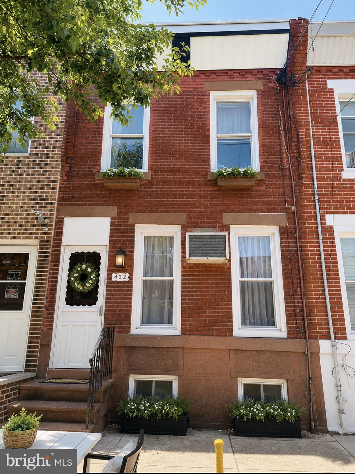 Welcome to 422 wolf street, a solid brick rowhome located in the heart of South Philadelphia's desirable Whitman neighborhood, Conveniently situated near shopping , restaurants, public transportation, and Whitman Plaza.
The property feathers a spacious rear yard, offering plenty of outdoor space for entertaining, gardening, or future improvements. The home has good bones and presents an excellent opportunity for an owner -occupant or investor to  add value through cosmetic updates and personal touches