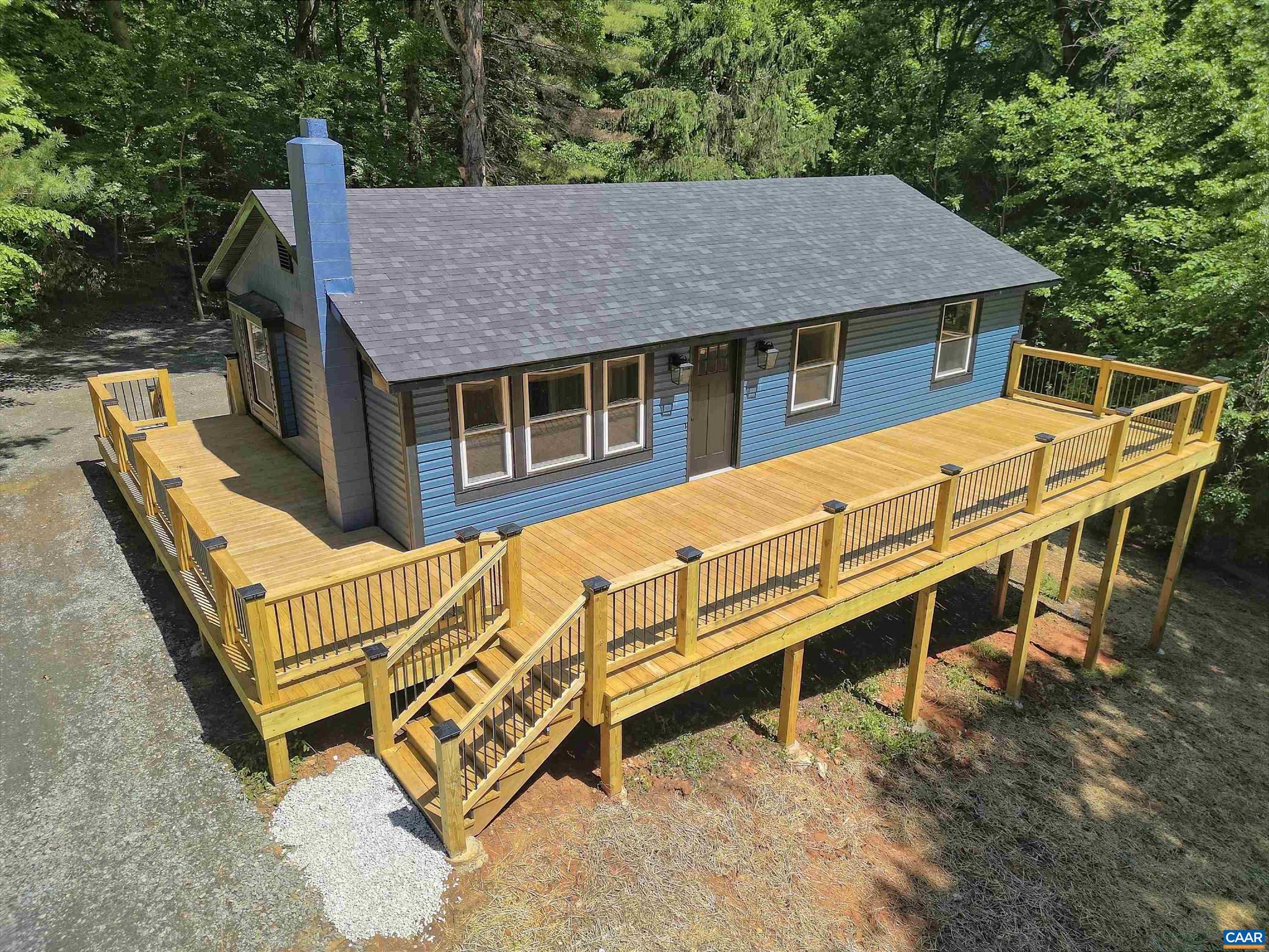 Wow!!!  Private 1.79 wooded acre retreat in a wonderful neighborhood.  The house has been updated top to bottom.  New roof, new deck, new siding, new flooring, new kitchen, new bathroom, new HVAC - pretty much new everything.  Come enjoy the nature views from the gorgeous new deck.  You will love it!  It feels like new, and it feels like home!,Quartz Counter