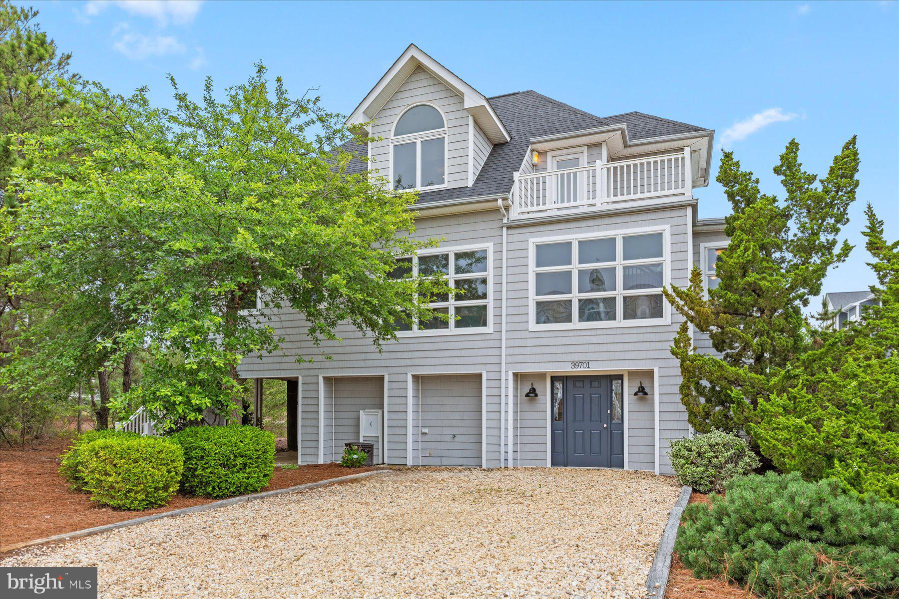 Just 2 homes off the Oceanfront, this meticulously maintained beach home is just steps to one of the finest stretches of private shoreline on the Delaware coast.   The main level features window-lined walls with bright southern exposure and expansive gathering spaces.   The combined dining/living room is adjacent to a charming, screened porch with an abundance of privacy and a large open deck that wraps around the western side of the home.  The well-equipped white kitchen offers ample storage and updated appliances.  Also on the main floor is a beautiful bedroom with an en-suite bath and a powder room for guests.  Step upstairs to find two sizable bedrooms, each with a private bathroom and one with a private balcony facing the oceanside of the home to catch peeks of the sunrise.  The ground level offers an additional family room, laundry, an abundance of storage space plus an outside shower and powder room. Enjoy the added peace of mind during storms with shutters on the Eastern side of the home. Situated on an oversized lot, this home is delightful as-is and offers tremendous potential to be expanded.  Located in a quiet gated North Bethany community just steps to a pristine, uncrowded beach with lifeguards, this home is offered with beautiful furnishings and is ready to be enjoyed this summer!