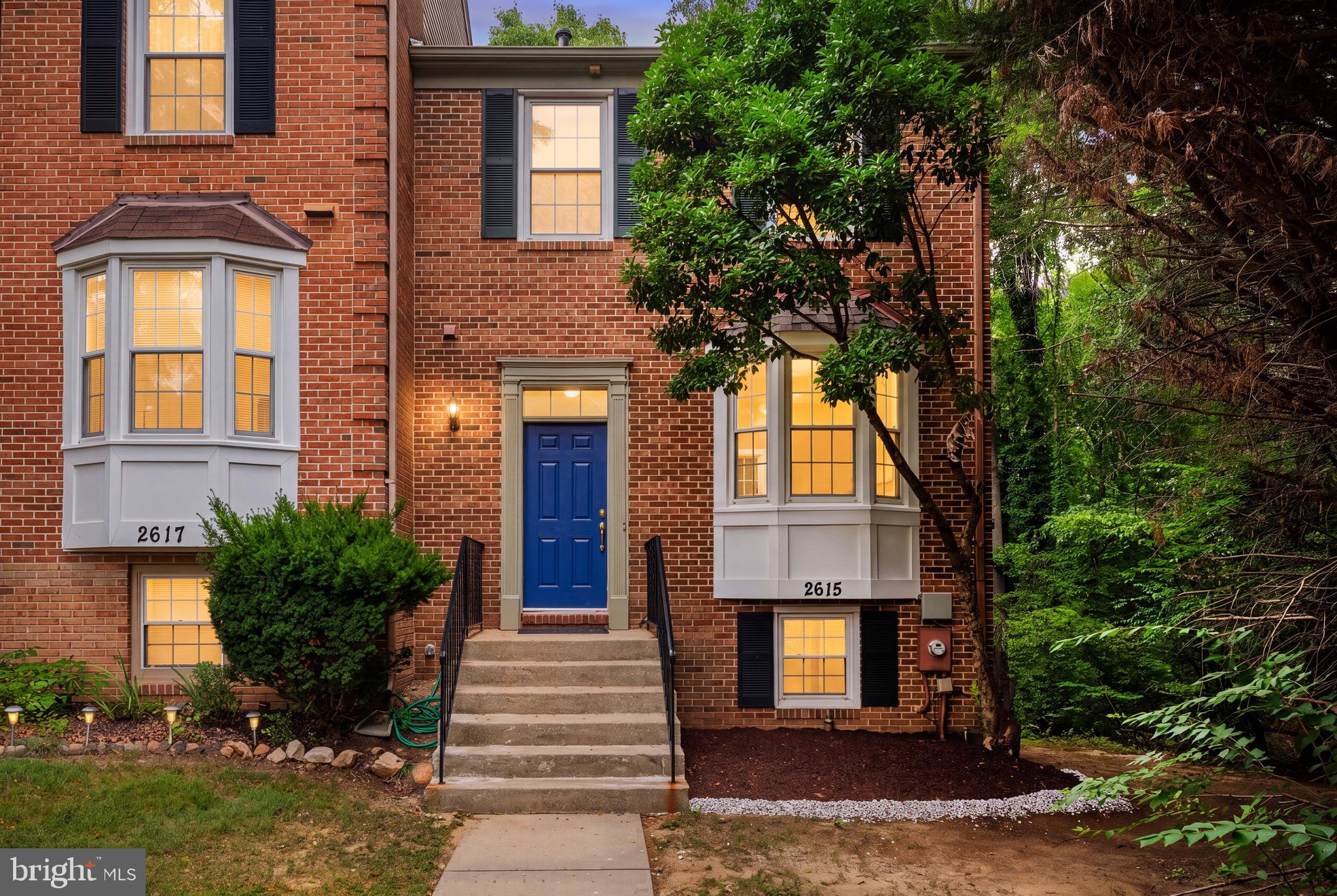 Welcome to this rarely available turnkey three level end unit brick townhome showcasing  4-BR 3.5 BA offering over 2,000 square feet in the sought-after Douglas Woods community. Top to bottom renovations include : NEW roof,  LVP flooring throughout, gourmet kitchen,  bathrooms, lighting,  and  washer/ dryer. The light filled main level features an open-concept layout that seamlessly connects the kitchen, dining, and living areas. The kitchen boasts all new cabinetry, quartz countertops, stainless steel appliances and table space. The spacious living room with bay window opens to the dining room and deck for outdoor living. A convenient powder room is located off the foyer. Upstairs, the primary suite impresses with a vaulted ceiling, closets with built-in shelving, en-suite bath with step-in shower, and a private balcony overlooking the trees. Two additional bedrooms and a full bath with tub-shower combo complete the upper level. The versatile lower level offers an additional bedroom, full bathroom, laundry,  and a spacious recreation room with a wood-burning fireplace and walk-out access to the fenced in rear patio. Enjoy outdoor living on the rear decks from both the main and upper levels. . Recent upgrades include: new roof (2026), new flooring (2026), new kitchen ( 2026)  cabinets , countertop and appliances, new washer/dryer ( 2026), new bathrooms ( 2026), new lighting (2026), and HVAC ( 2021) . Two assigned parking spots convey. Low annual HOA fee.  Unbeatable location in a quiet community just a short walk to Metro, Westfield Mall, AMC Theatres, public library, Evans Parkway Park & Playground, and minutes to all the dining and shopping in downtown Silver Spring, Wheaton, and Kensington.