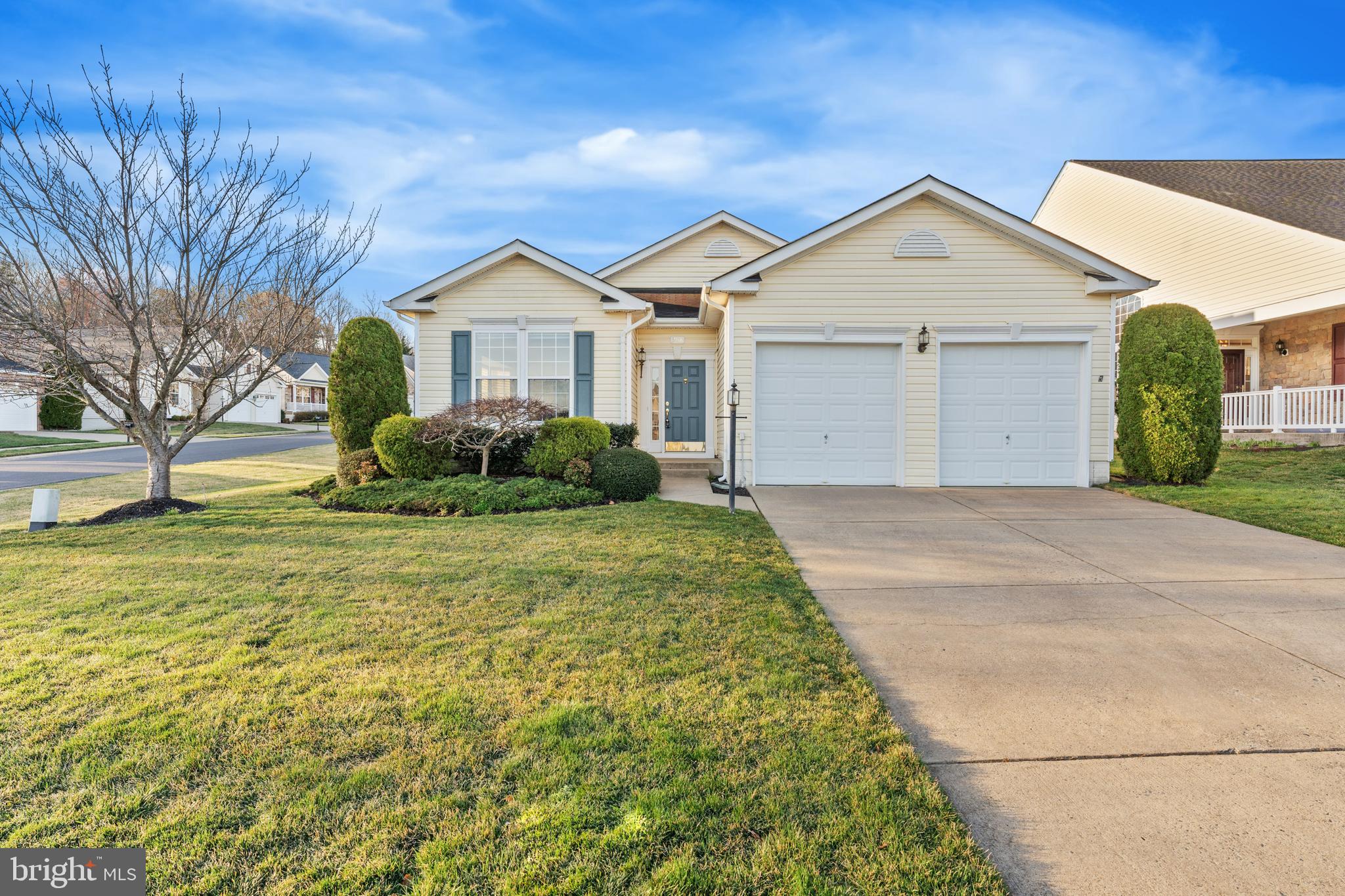 Welcome to the serene neighborhood of Four Seasons at Historic Virginia!  This 55+ community offers so many great amenities with well-maintained common areas and features nice wide streets with sidewalks everywhere!  This sun-drenched home boasts one-level living with two bedrooms and two full baths.  The primary suite is huge!  It offers an adjoining large bath with shower and soaking tub as well as a double vanity! The adjacent closet is also very spacious with amazing storage for all your personal items.  It's so big that you can place furniture inside this closet.  The second bedroom offers a spacious wall to wall closet and has a hall bath with shower.  The home features a large living/dining room combination, a very open kitchen with new granite counters, an eat-in area that opens to a second living space.  New flooring throughout, and new carpet in the primary suite.  Freshly painted.  The spacious garage offers two bays and plenty of room for storage. 

The community offers a gorgeous clubhouse, indoor/outdoor swimming pool, exercise classes, pickleball courts, tennis courts, bocce ball, various clubs, library, fitness center, and front security gate. Enjoy all the numerous walking/jogging trails located throughout the neighborhood. There are great things to do in the area including: beautiful parks, restaurants, libraries, and several golf courses located within minutes of the neighborhood. Easy access to I95, the Virginia Railway Express (VRE), Fort Belvoir, Quantico, dining, shops, local hospital, and so much more!  Welcome home!