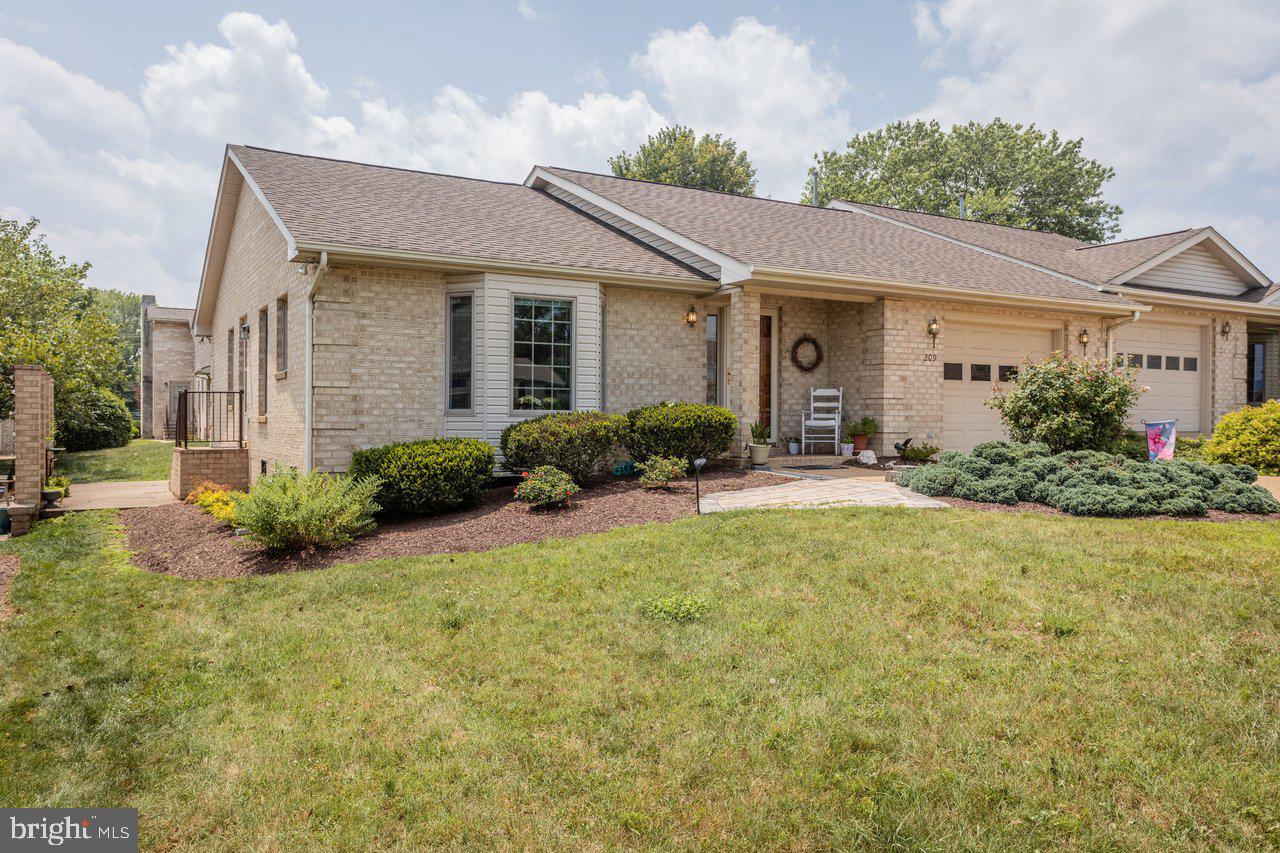 Welcome to easy, one-level living in the desirable Grandview Estates community! This well-maintained duplex offers 2 bedrooms, 2 full baths, and a thoughtfully designed floor plan filled with natural light. The spacious living area flows seamlessly into the dining space and kitchen, creating the perfect layout for everyday living and entertaining. The primary suite features a private bath, while the second bedroom provides flexibility for guests or a home office. Enjoy peaceful mornings or relaxing evenings outdoors, along with the convenience of an attached garage and low-maintenance living. Ideally located just minutes from downtown Woodstock, shopping, restaurants, schools, Shenandoah Memorial Hospital, and I-81, this home offers comfort, convenience, and beautiful Shenandoah Valley living. Don't miss this wonderful opportunity