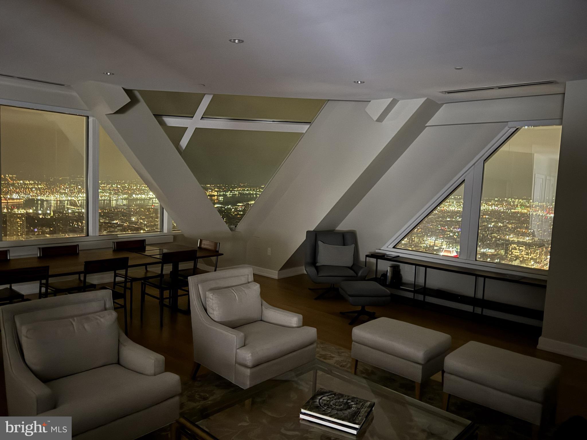 Luxurious skyline home on the 53rd floor of The Residences at Two Liberty Place by architect Cope Linder and Furey Design. The Residences at Two Liberty Place are widely described as the highest residential address between Philadelphia and Chicago. 3 spacious bedrooms plus den and 3.5 baths with unparalleled East, South, and West views of Philadelphia, the Schuykill River, the Delaware River (and where they meet) and beyond! Mint condition residence constructed from raw space in 2016 with high-end finishes throughout. This sophisticated residence is complemented by finishes such as Calacatta marble, Snaidero cabinetry, Miele appliances, Sub-Zero refrigerator and Nest thermostats. Custom Lutron electric Smart Shades throughout with remote controls. Primary bedroom suite with walk-in-closet and marble 4-piece bath. Spacious den currently used as a media room and home office. This home includes a storage unit on the 40th floor. Pet-friendly building and state-of-the-art amenities on the newly renovated 37th floor include 24/7 fitness center, yoga studio, endless indoor pool, massage room, steam room, sauna, conference room, sitting room with views of William Penn on City Hall, resident lounge with fireplace,  billiards and kitchen, business center, 24-hour concierge services and chauffeur driven town car. On-site valet or self parking is available for an additional cost. Fantastic location in the heart of Center City with easy access to the Shops at Liberty Place, near hospitals, universities, City Hall, Comcast Centers, restaurants, entertainment, shopping and all Center City has to offer.